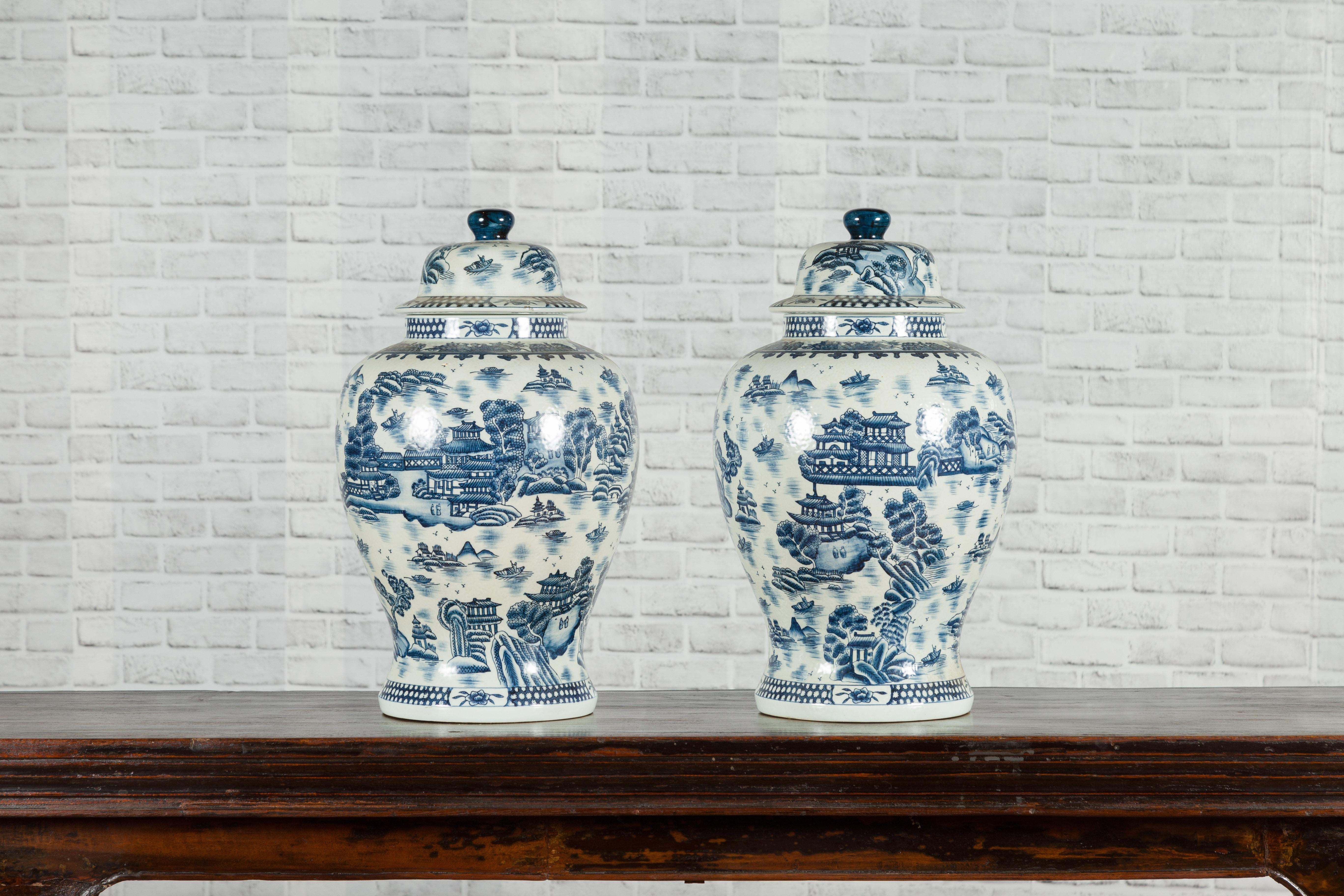 Pair of Vintage Chinese Blue and white Porcelain Temple Jars with Architectures In Good Condition In Yonkers, NY