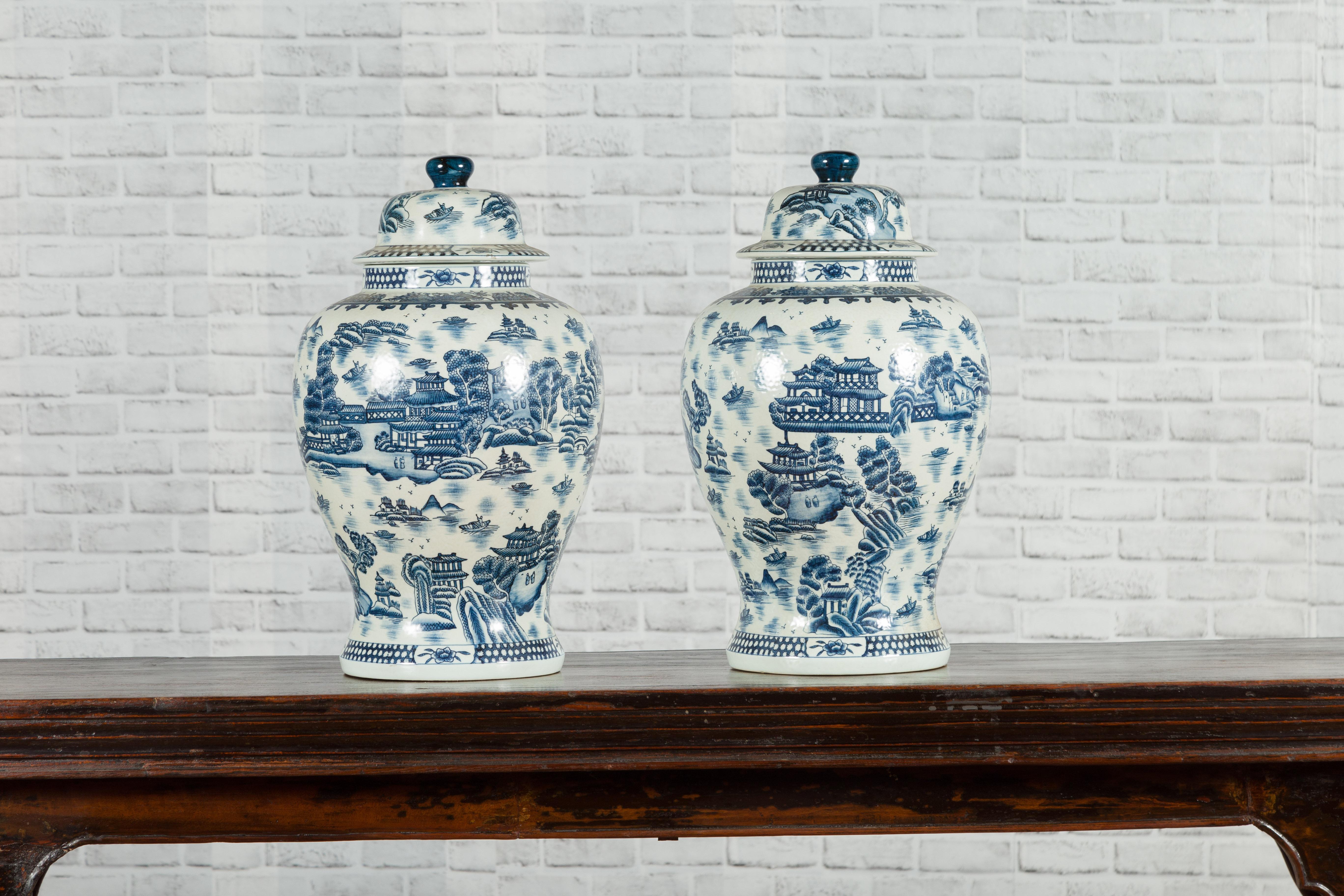 20th Century Pair of Vintage Chinese Blue and white Porcelain Temple Jars with Architectures