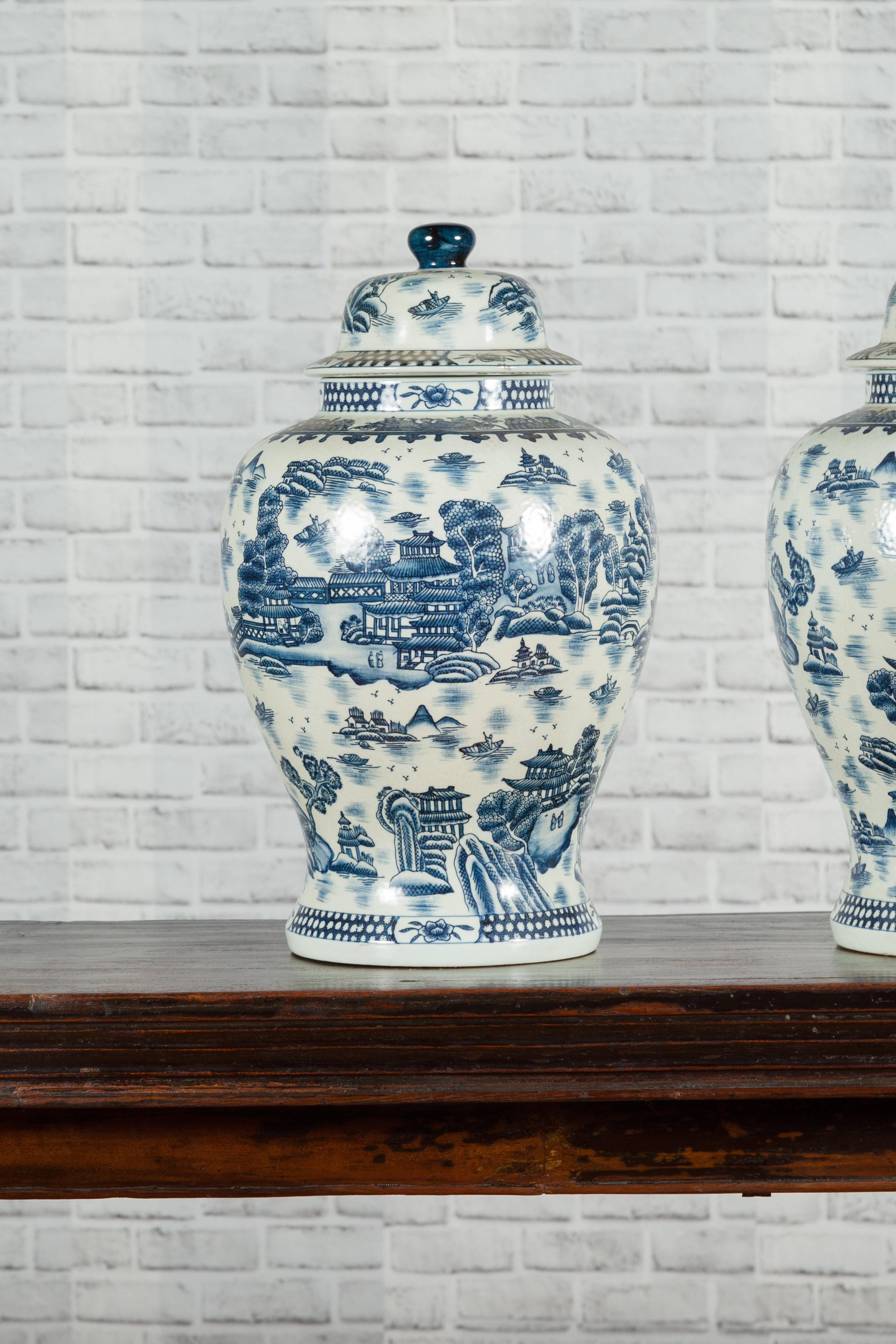Pair of Vintage Chinese Blue and white Porcelain Temple Jars with Architectures 1
