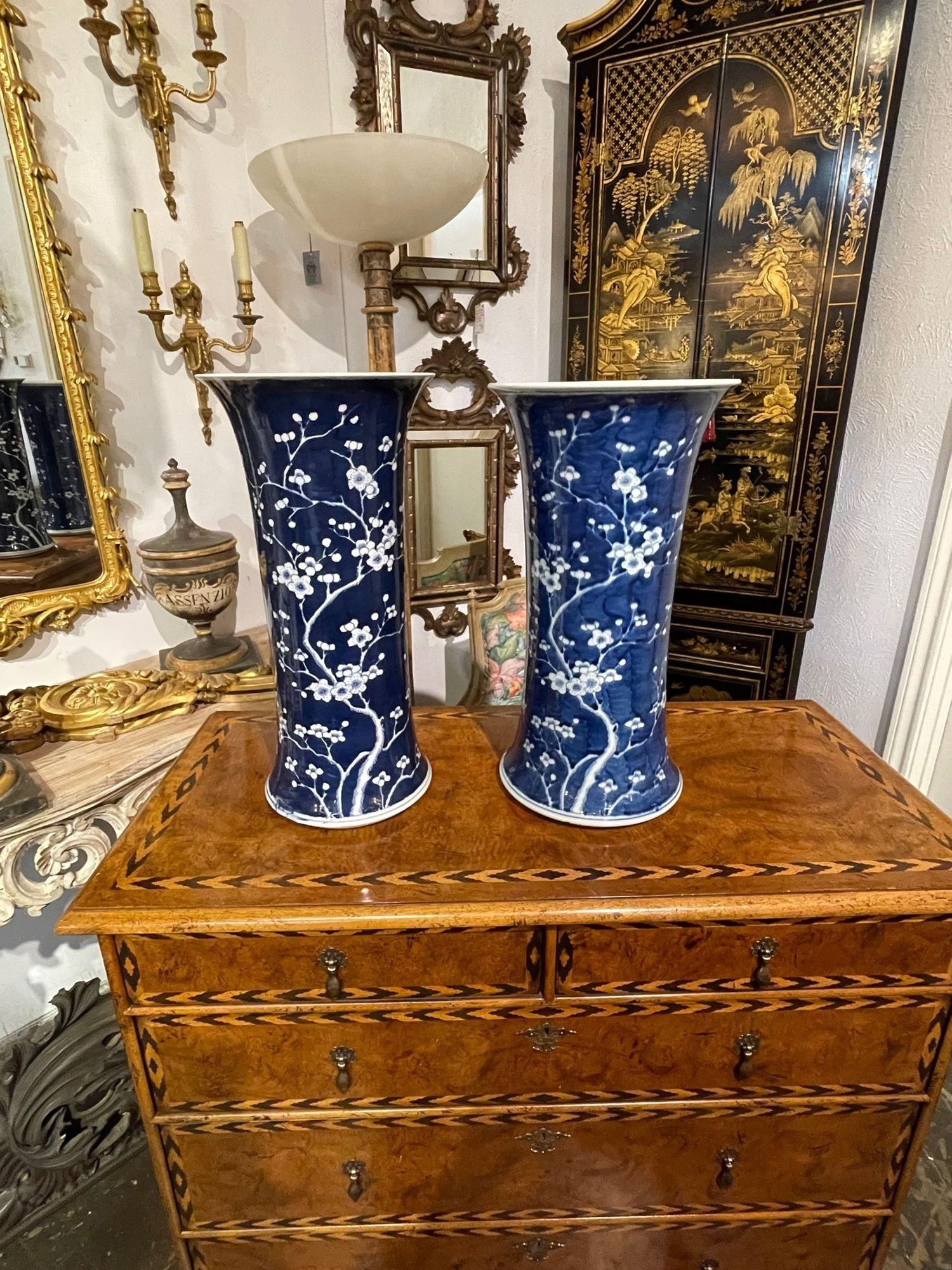 Fine pair of vintage chinese blue and white porcelain vases. Very pretty floral pattern. A lovely accessory for a fine home. These would also make a nice gift!!