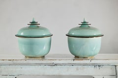 Pair of Vintage Chinese Celadon Lidded Jars with Crackle Glaze and Tiered Finial