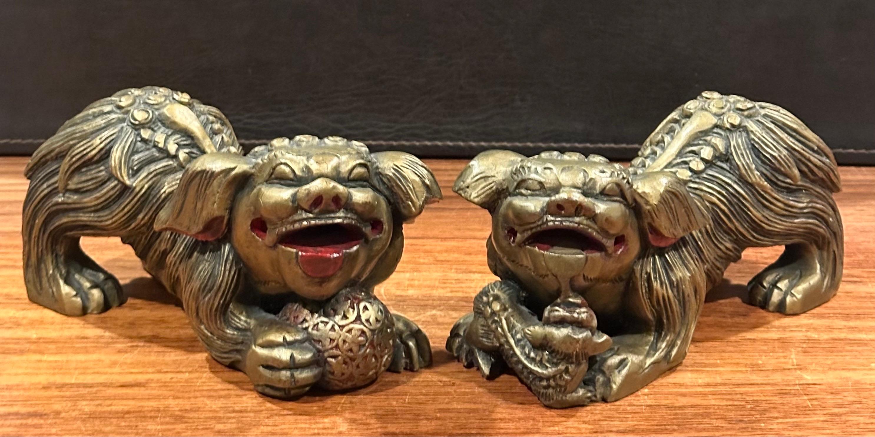 Hand-Carved Pair of Vintage Chinese Gold Gilt Wood Carved Foo Dogs For Sale