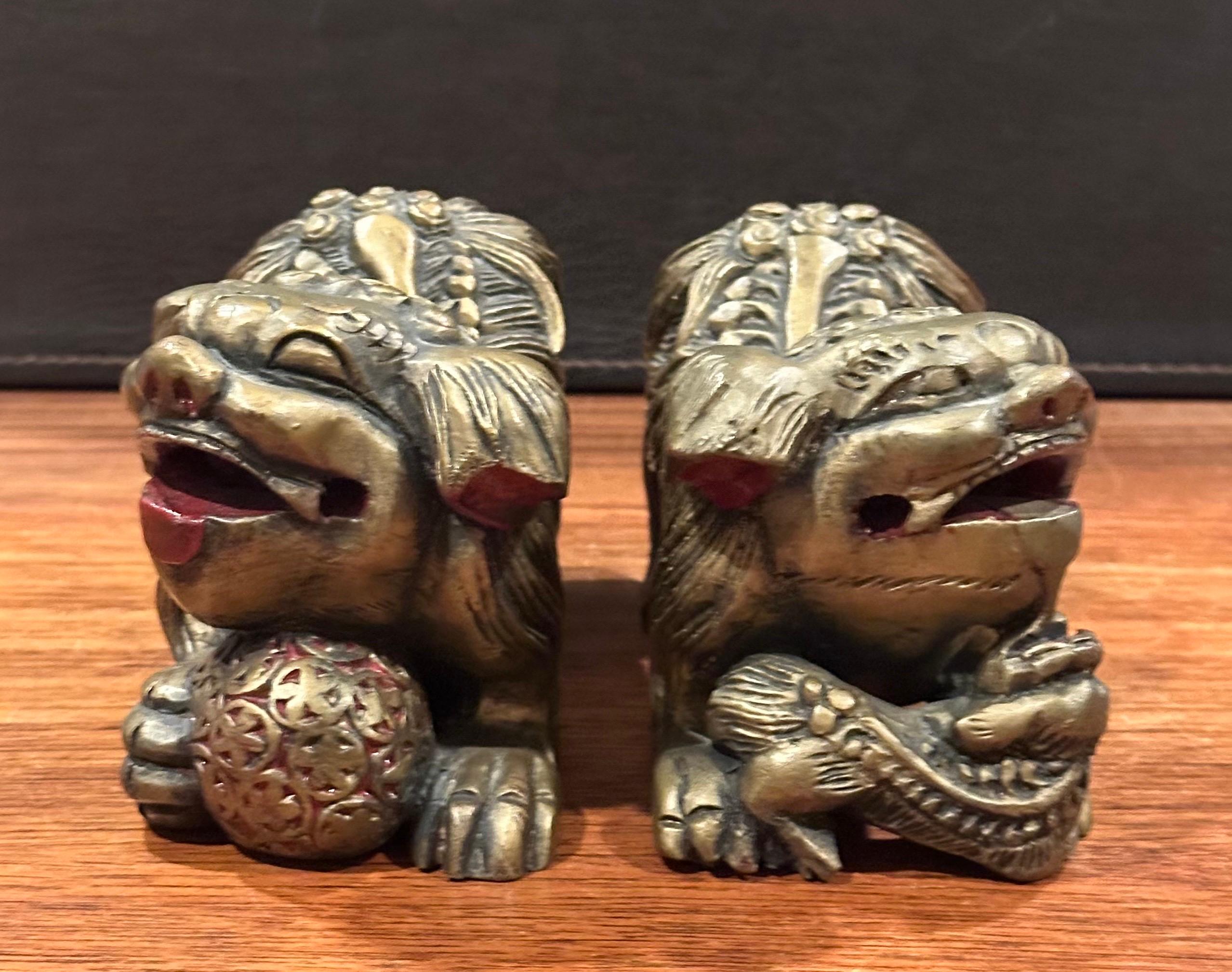Pair of Vintage Chinese Gold Gilt Wood Carved Foo Dogs In Good Condition For Sale In San Diego, CA