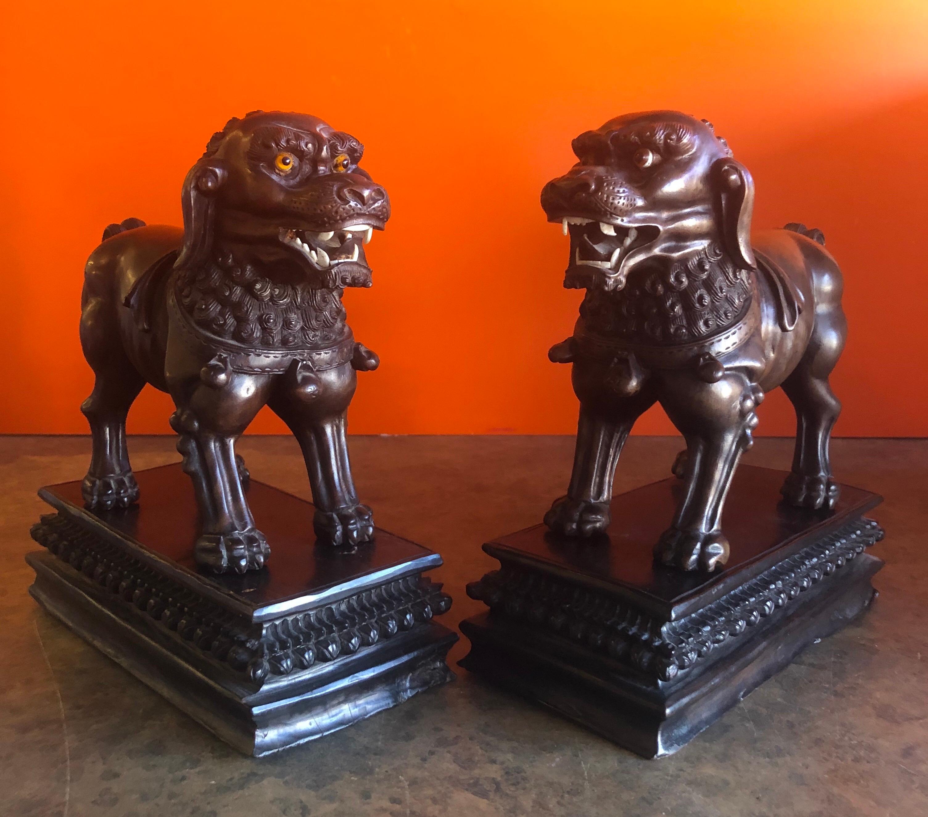 Hardwood Pair of Vintage Chinese Hand Carved Hard Wood Foo Dogs For Sale