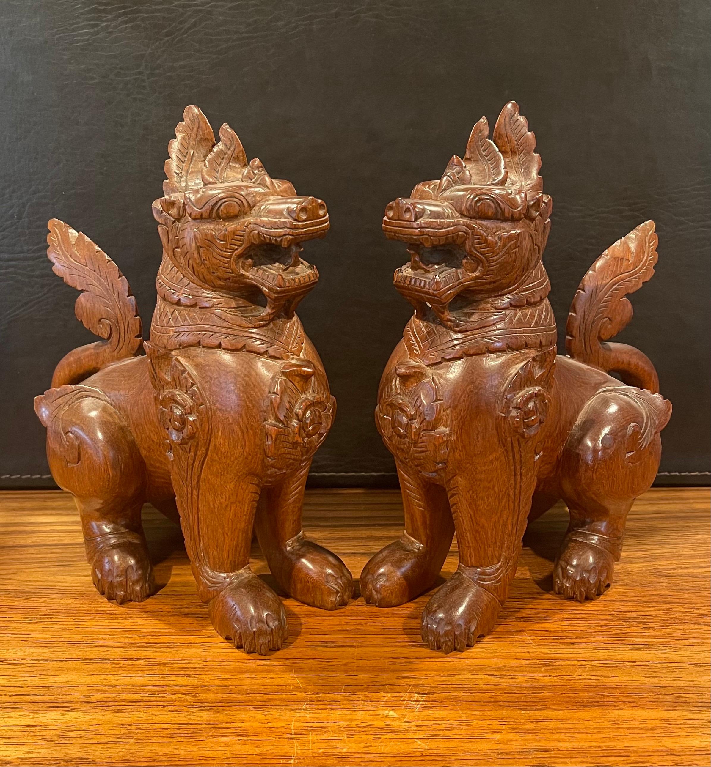 Pair of Vintage Chinese Hand Carved Hard Wood Foo Dogs For Sale 6