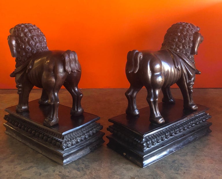 Pair of Vintage Chinese Hand Carved Hard Wood Foo Dogs For Sale at