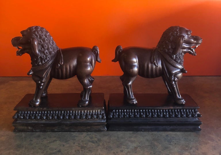 Pair of Vintage Chinese Hand Carved Hard Wood Foo Dogs For Sale at