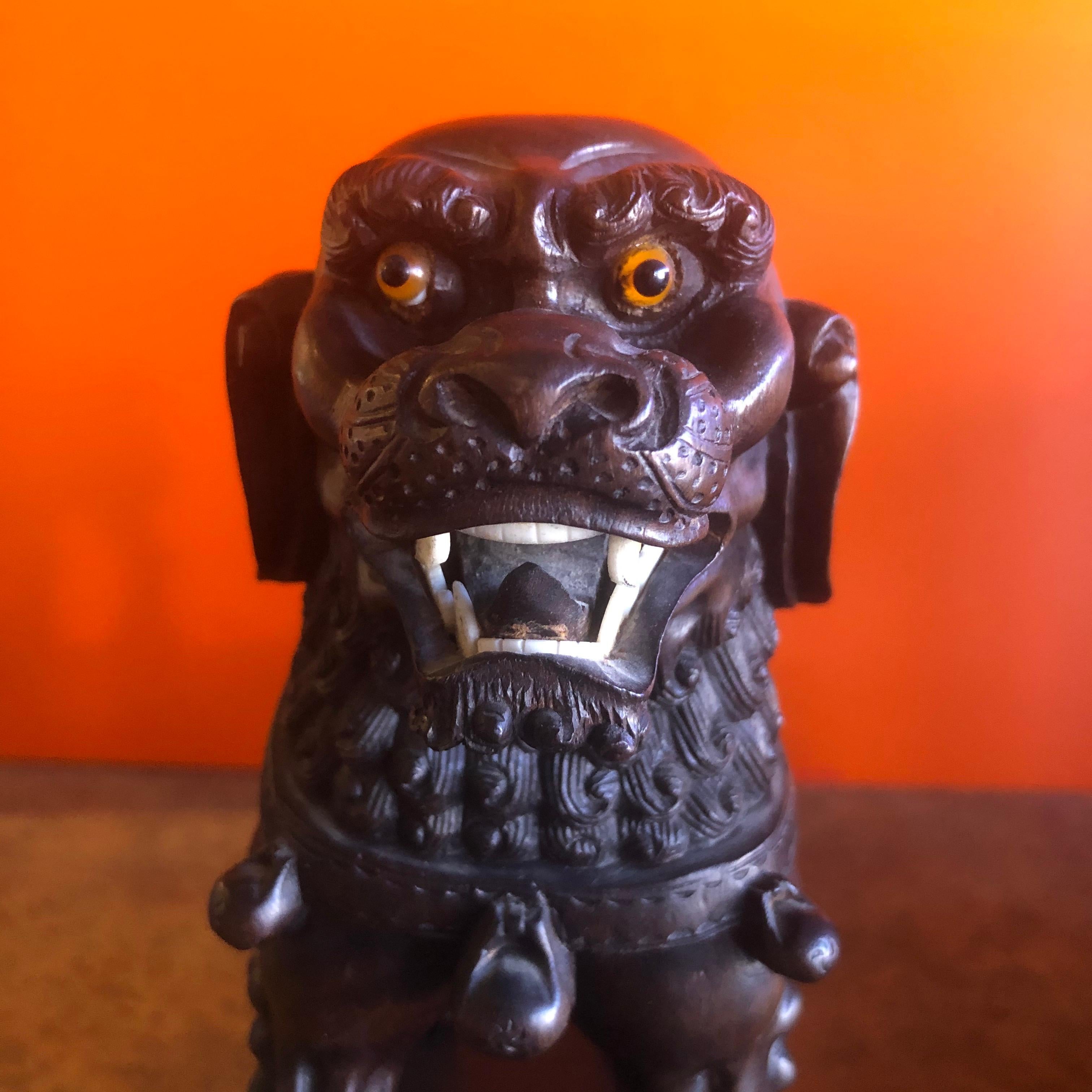 Pair of Vintage Chinese Hand Carved Hard Wood Foo Dogs In Good Condition For Sale In San Diego, CA
