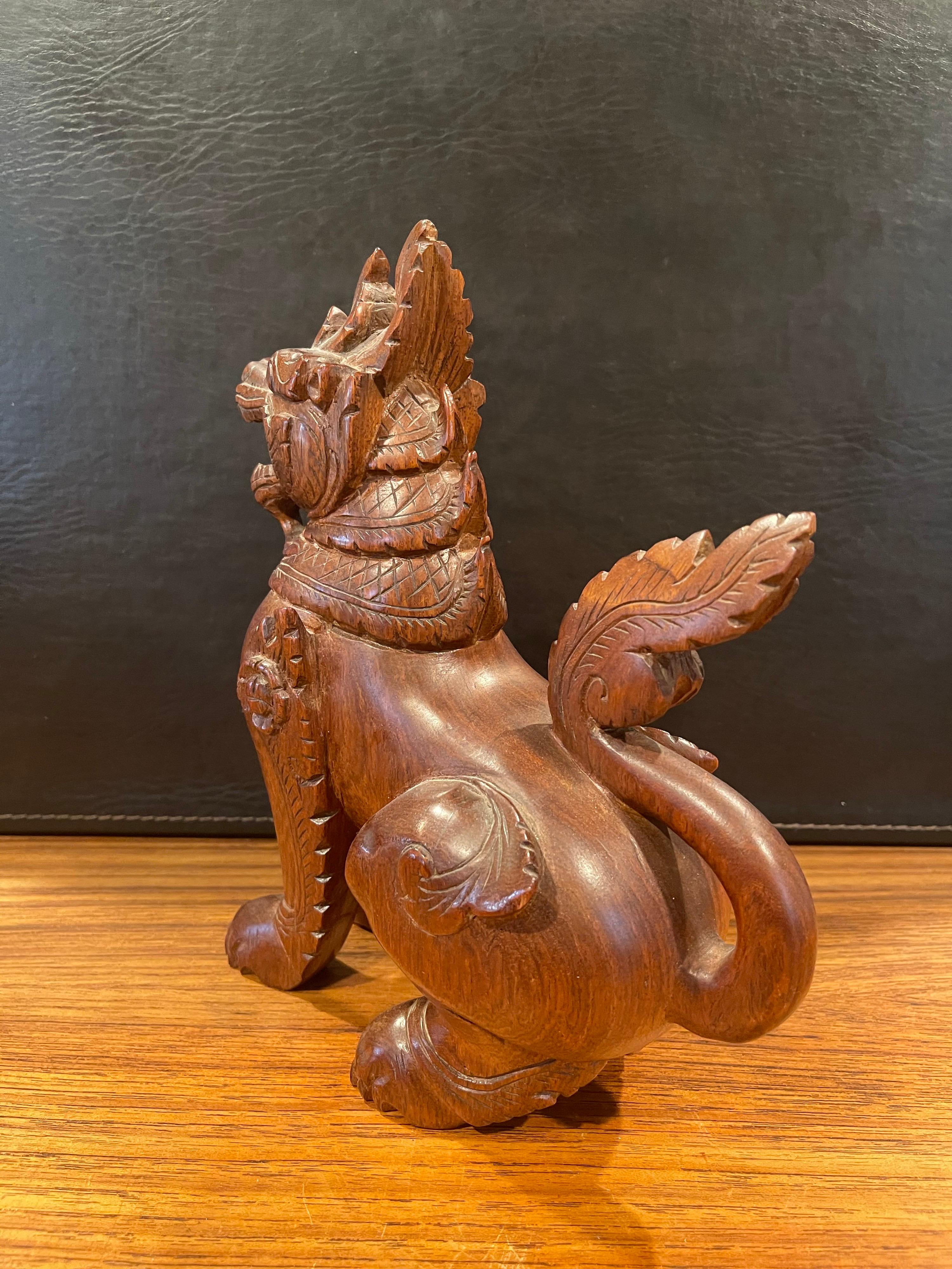 Hardwood Pair of Vintage Chinese Hand Carved Hard Wood Foo Dogs For Sale