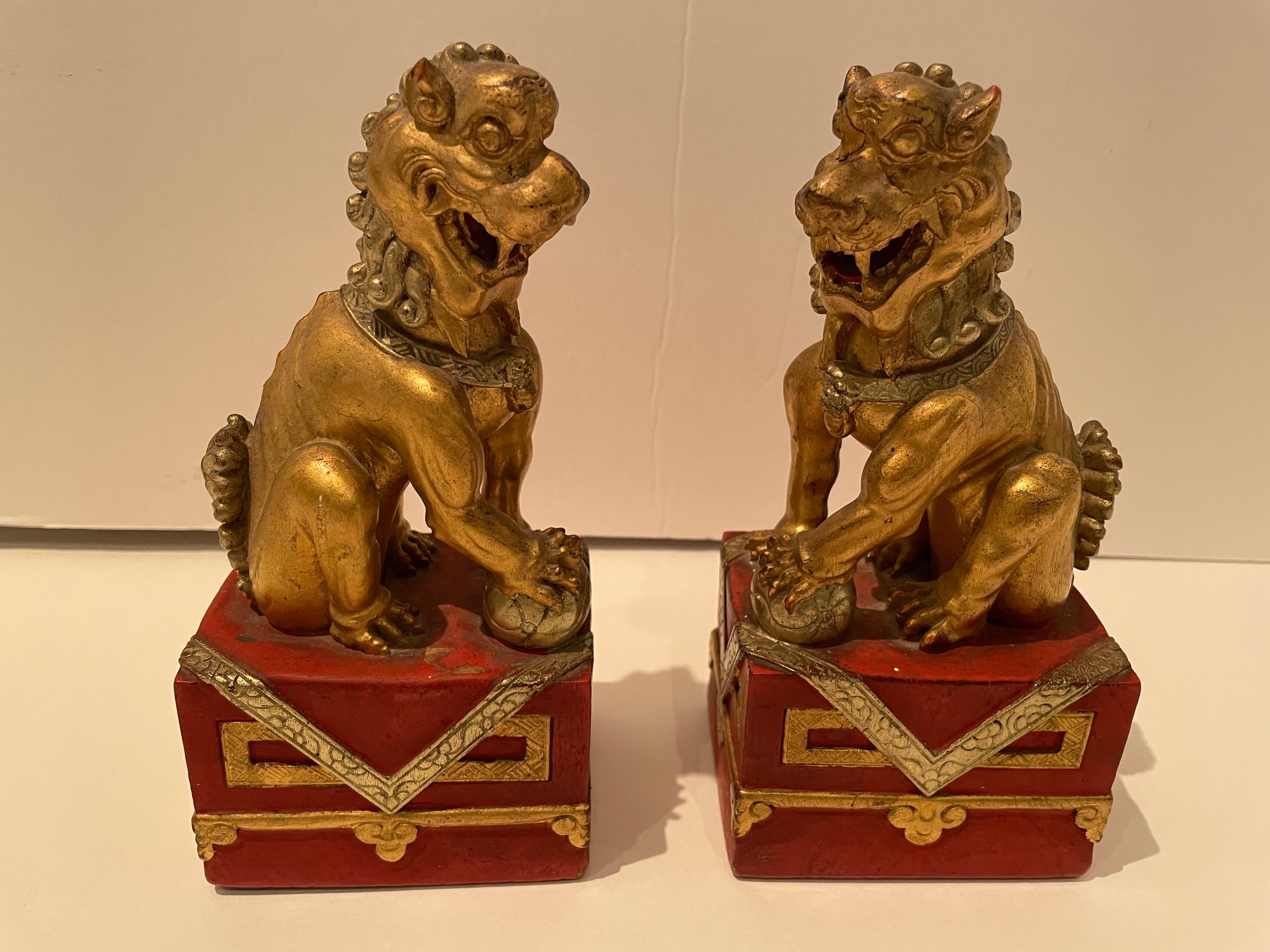 Wood Pair of Vintage Chinese Red and Gilt Buddhistic Lions For Sale