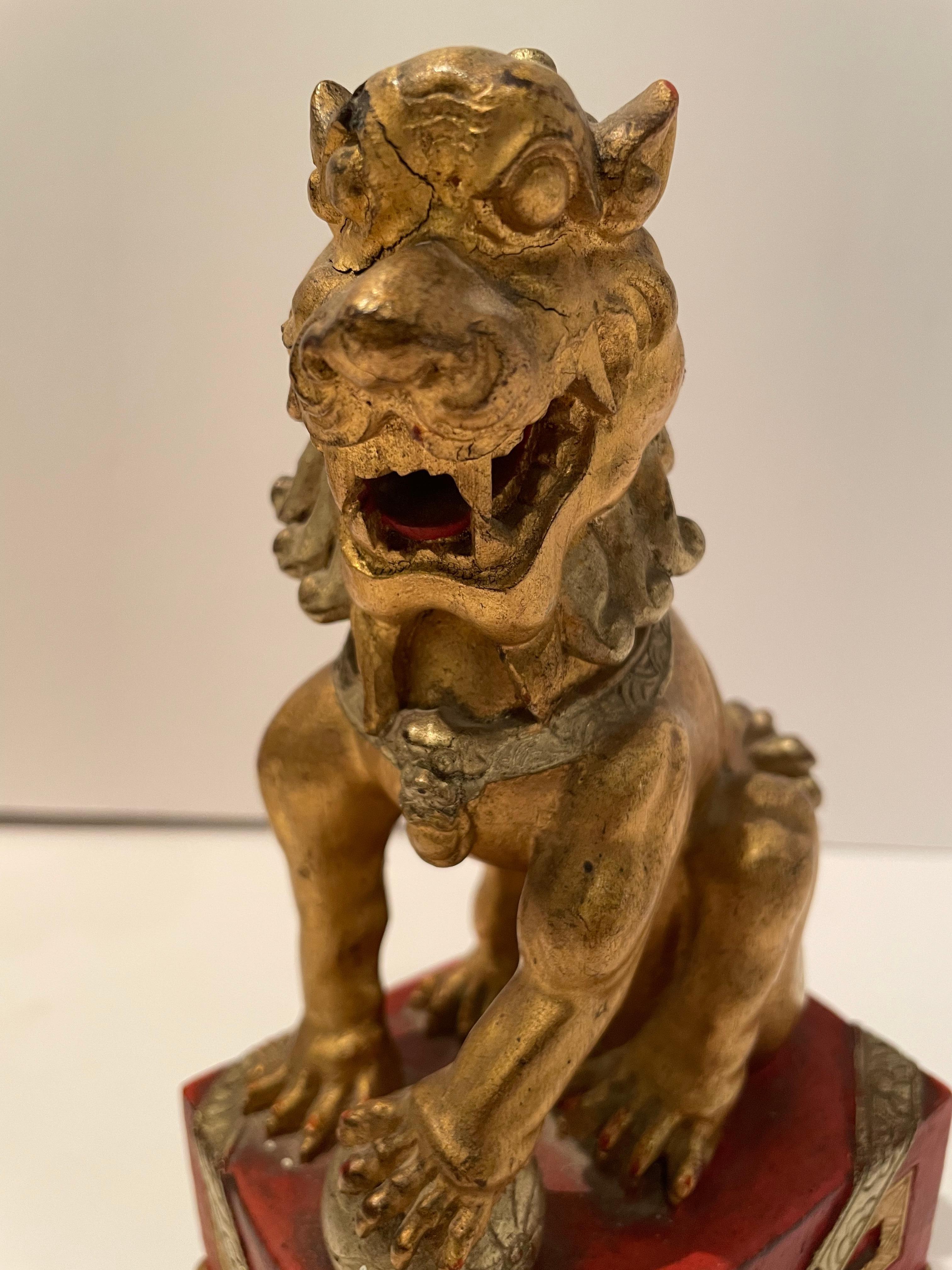 Pair of Vintage Chinese Red and Gilt Buddhistic Lions For Sale 1