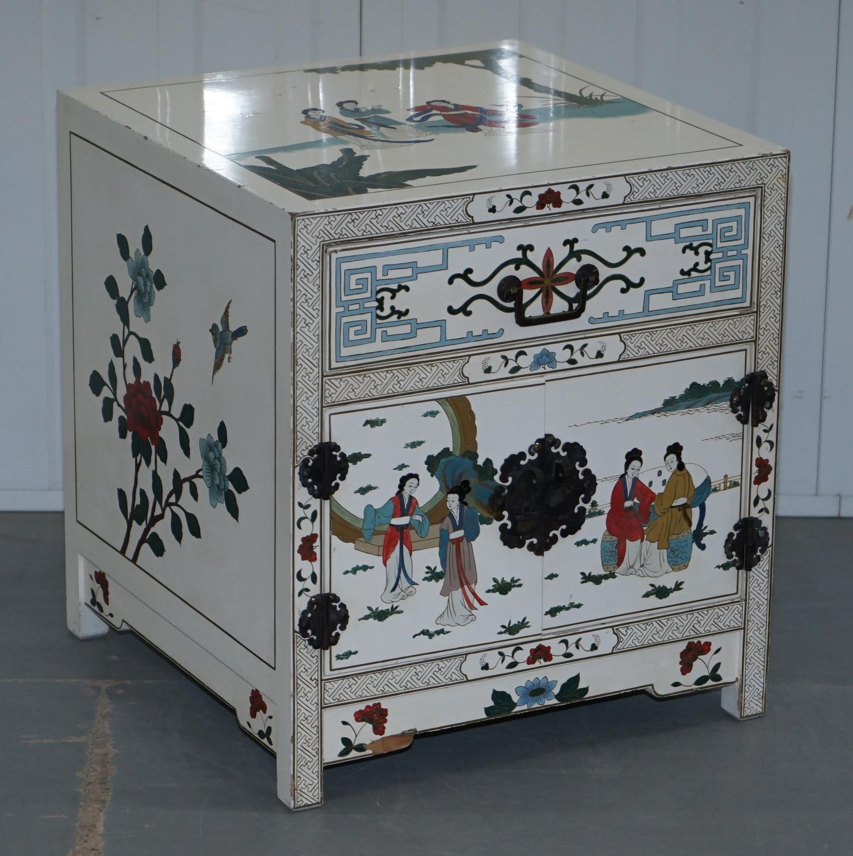 We are delighted to offer for sale this pair of lovely vintage Chinese white lacquered hand painted side chests for the bedroom or living room

A very ornately decorated pair in the Chinese style, they are vintage and have chips to the timber and
