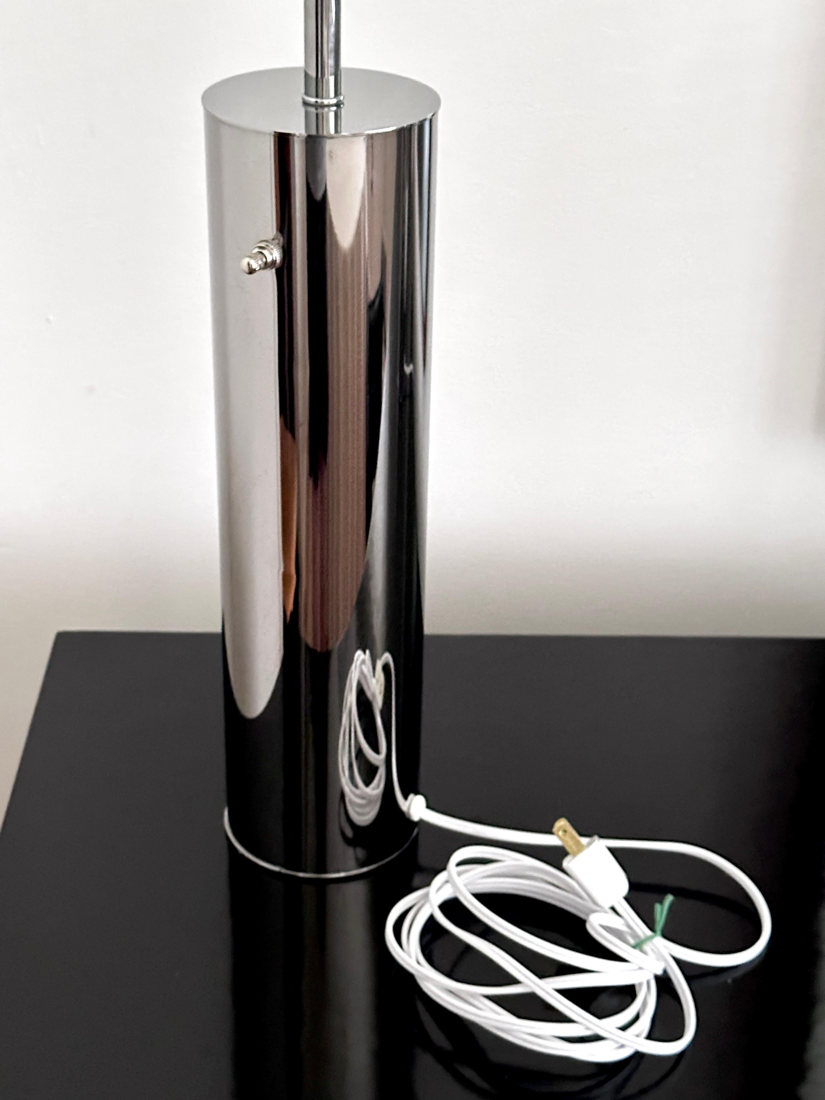 Mid-20th Century Pair Of Vintage Chrome Cylindrical Table Lamps From Nessen Studios For Sale