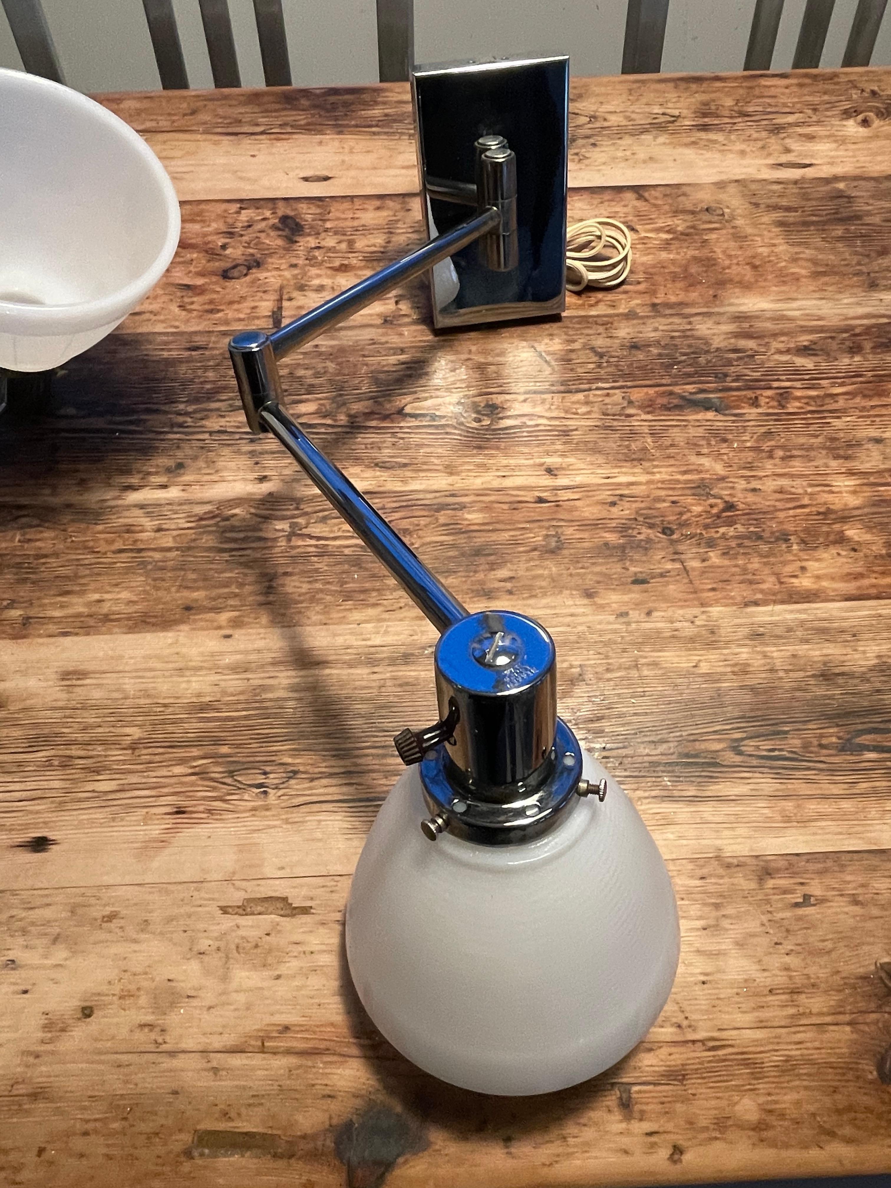 20th Century Pair of Vintage Chrome Walter Von Nessen Swing Arm Wall of Sconce Lamps For Sale