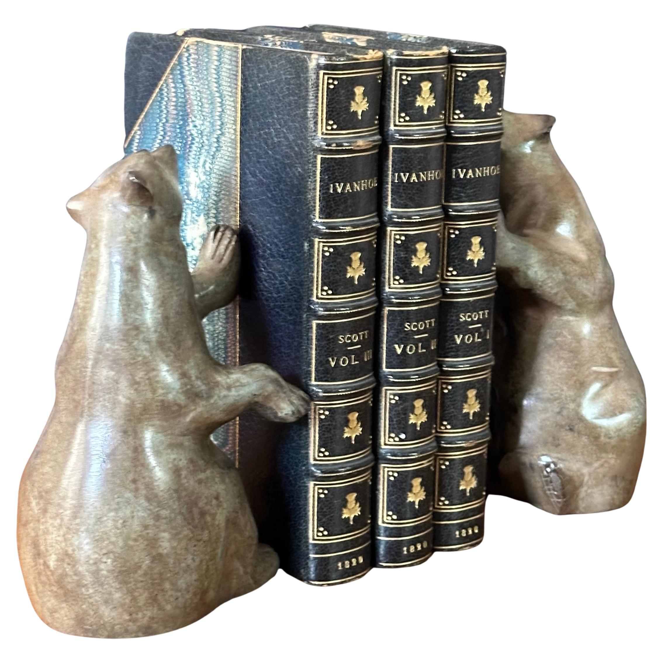 A lovely pair of vintage cold painted bronze bear bookends, circa 1980s.   The pair are in very good vintage condition and measure 8.5