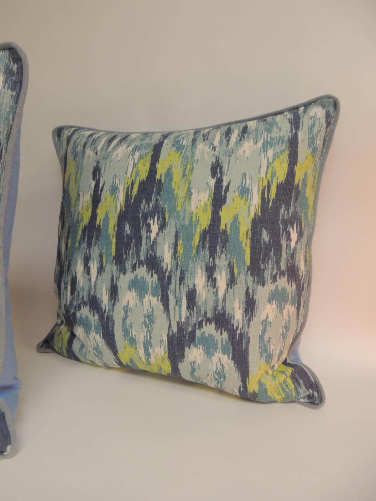 Pair of vintage colorful square bark cloth large decorative pillows with cotton welt all around and 
ATG blue linen backings. The backings are ATG custom design. In shades of blue, yellow, natural and white.
Ideal as floor pillows.
Size: 24 x 24 x 6.
