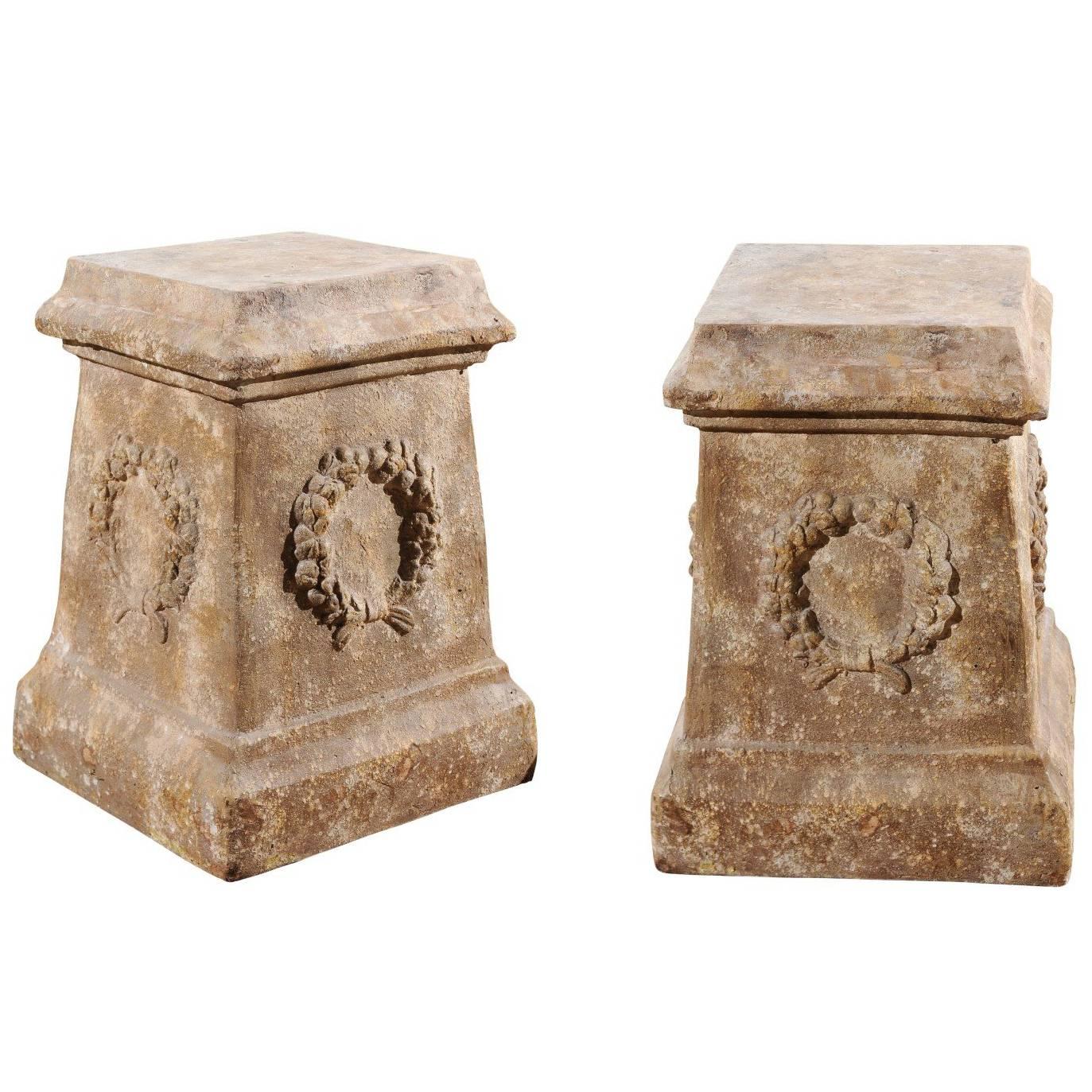 Pair of Vintage Continental Faux Stone Garden Plinths with Wreath Motifs, 1960s For Sale