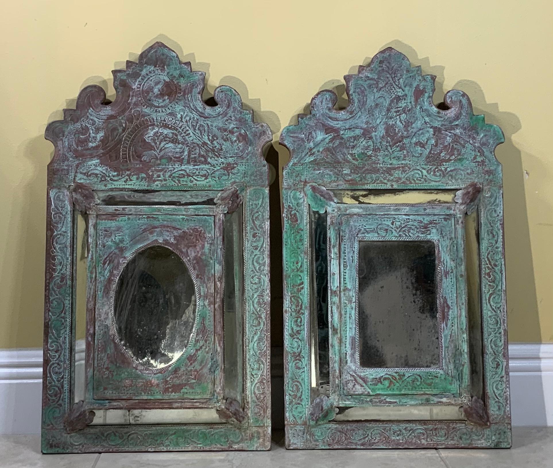 Exceptional pair of mirror made of wood and overlay with decorative copper, originally each mirror had indoor compartment, but it was seal and can be use as decorative mirror. Most mirror are blurry and foggy and few minor cracks, see photos, the