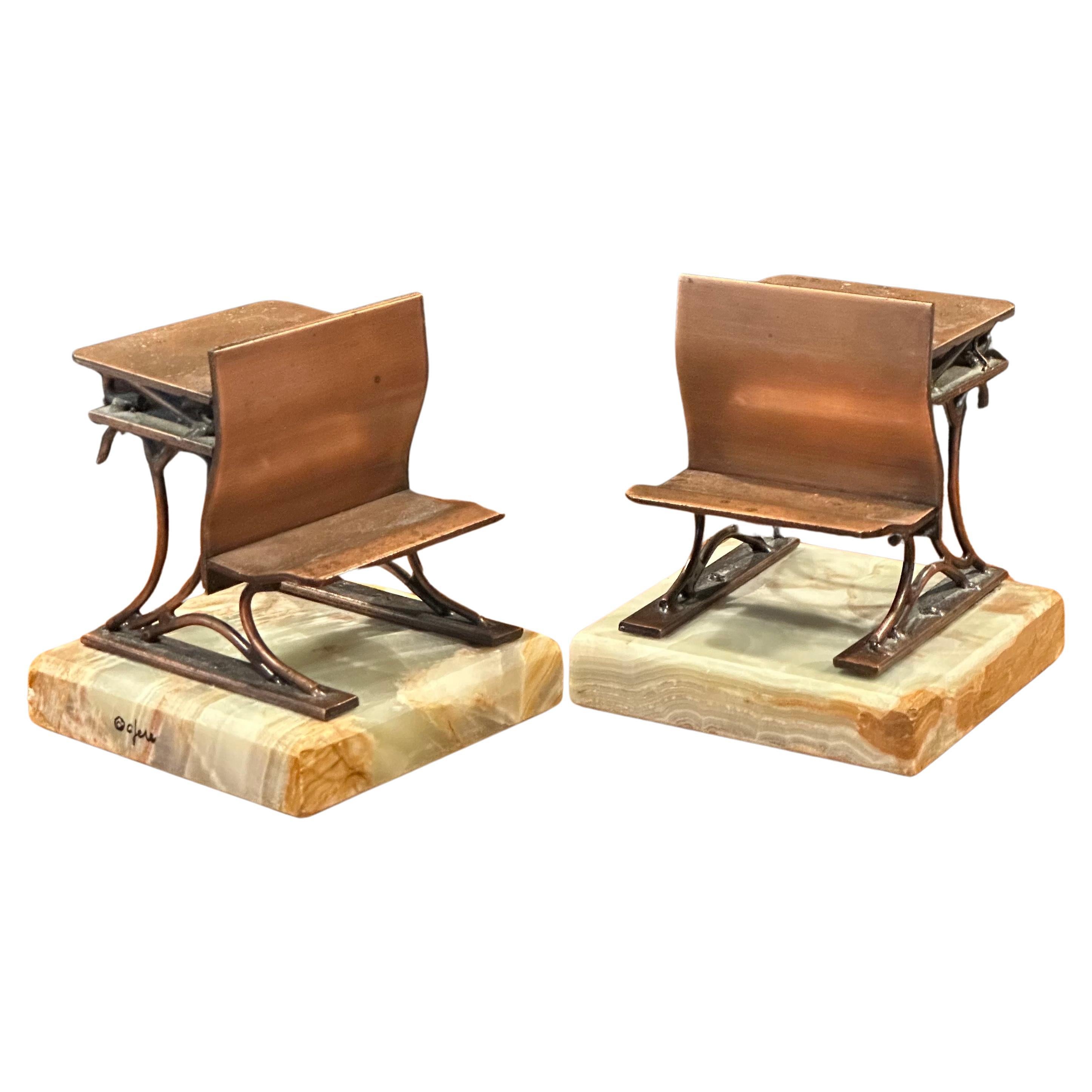 A nice pair of vintage copper school desks on onyx base bookends by Curtis Jeré for Artisan House, circa 1970s. The set is signed on the base and are in very good vintage condition with a wonderful patina. They measure 8