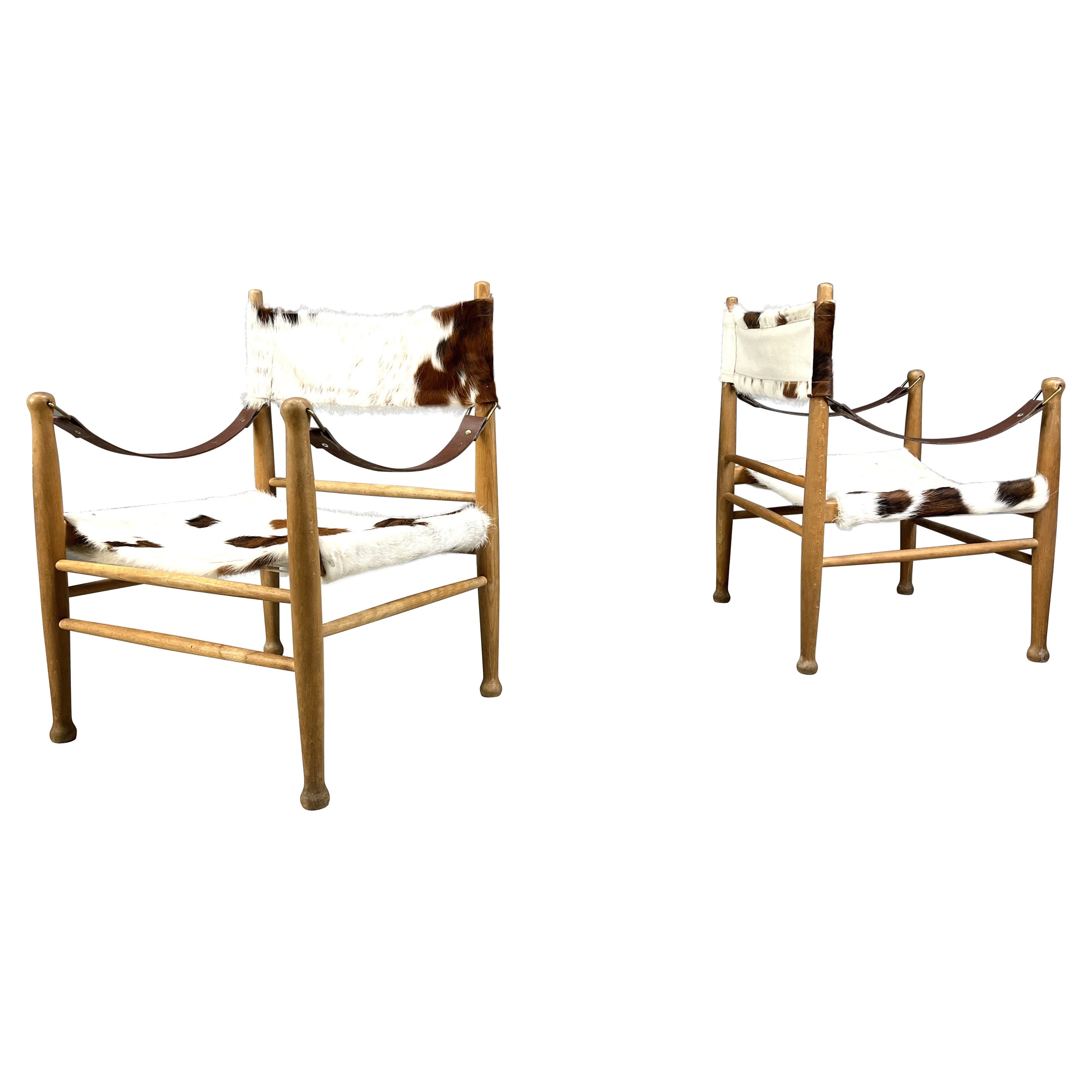 Pair of vintage cowhide safari armchairs, 1960s