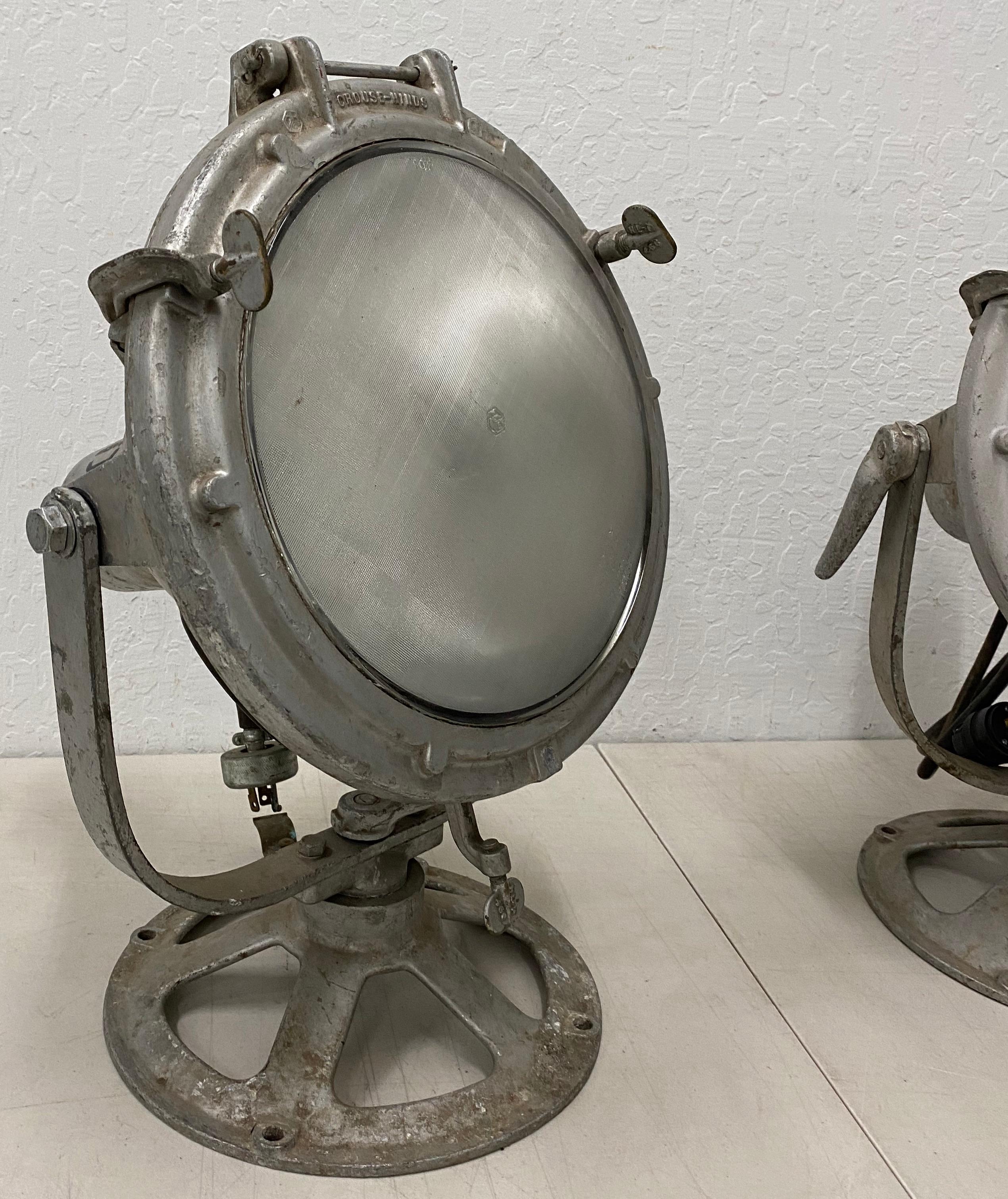 Pair of vintage Crouse-Hinds nautical searchlights, circa 1930

Matching pair of nautical spotlights

Not tested for use

Have them rewired by a professional for home use

Each light measures 14.5