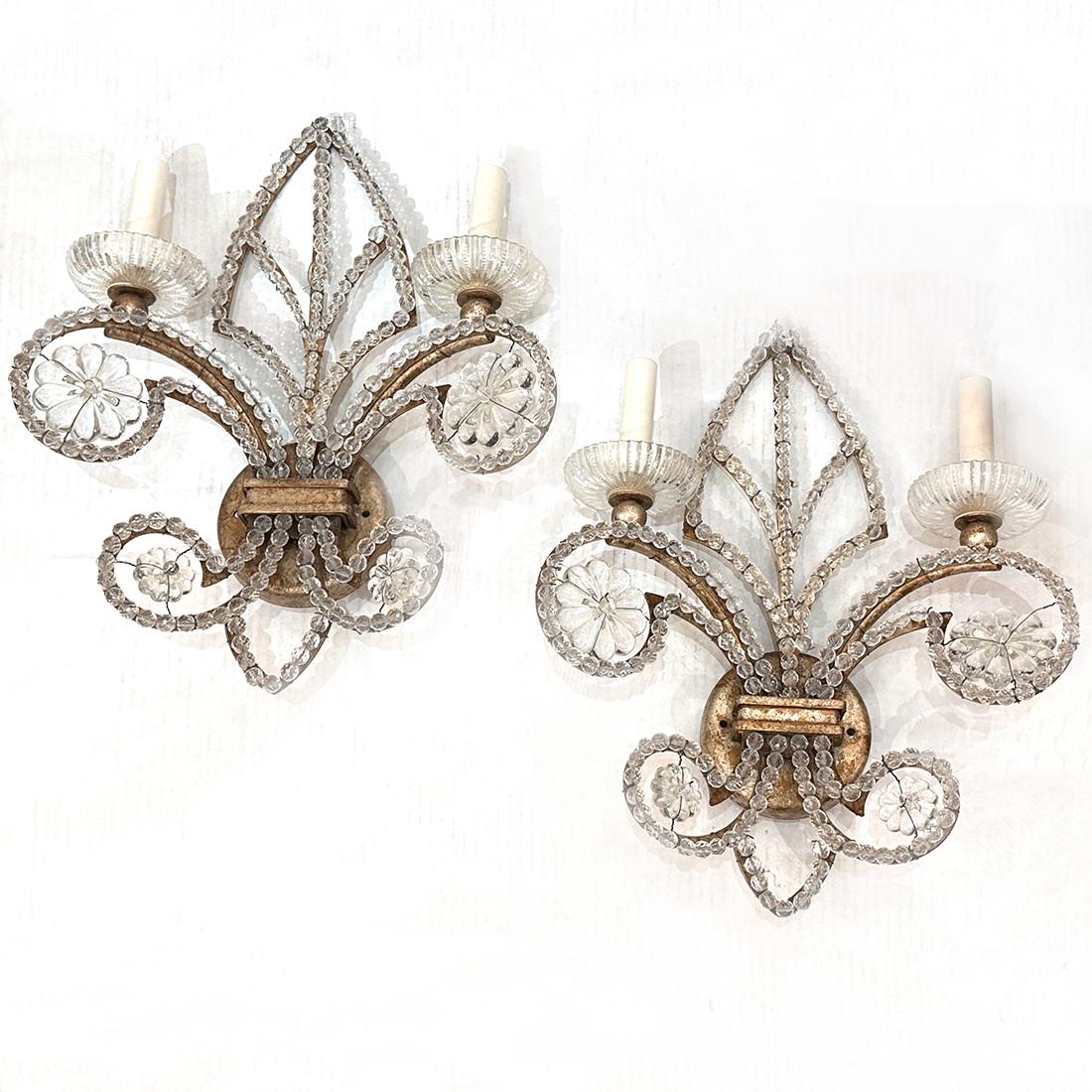 Pair of circa 1960's French beaded crystal sconces.

Measurements:
Height: 17.5