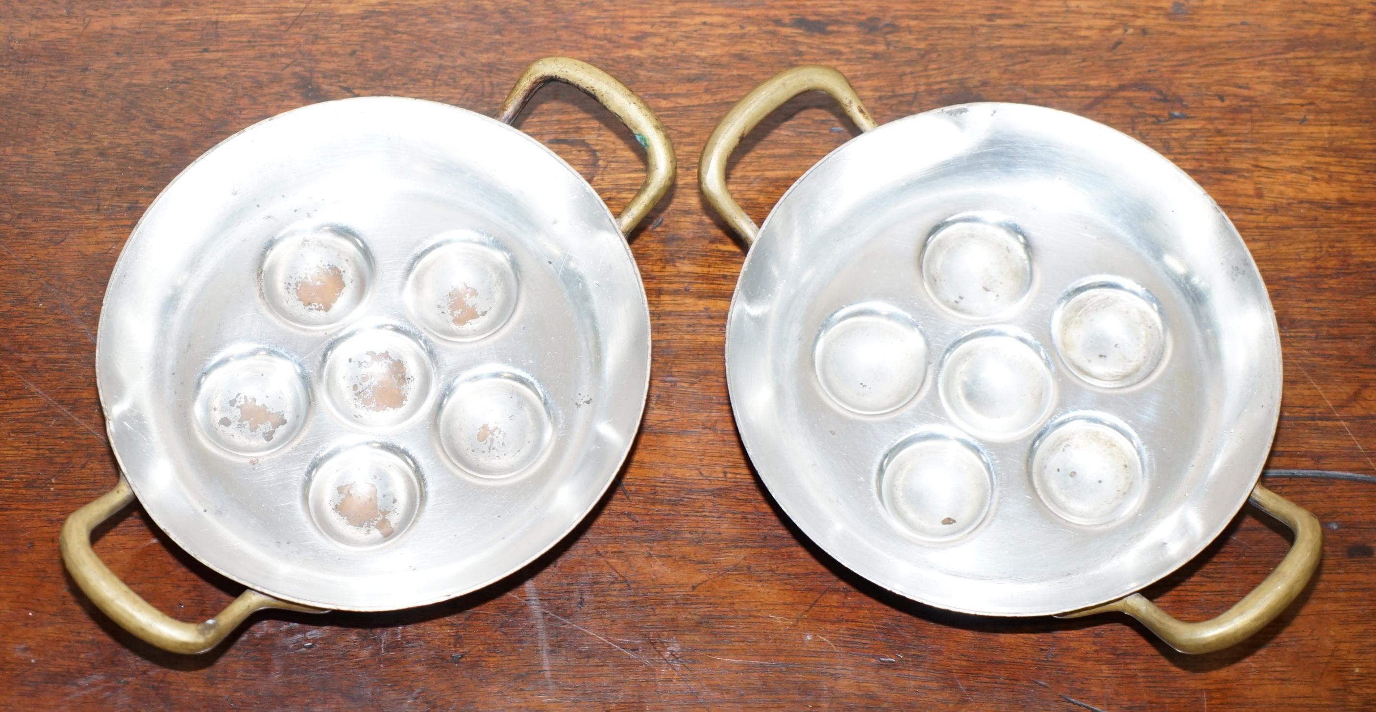 We are delighted to offer for sale this stunning pair of vintage Culinox Snail pans with copper outers and silver plated inners

A very good looking and decorative pair of pans, both are stamped made in Sweden with the Culinox label

We have