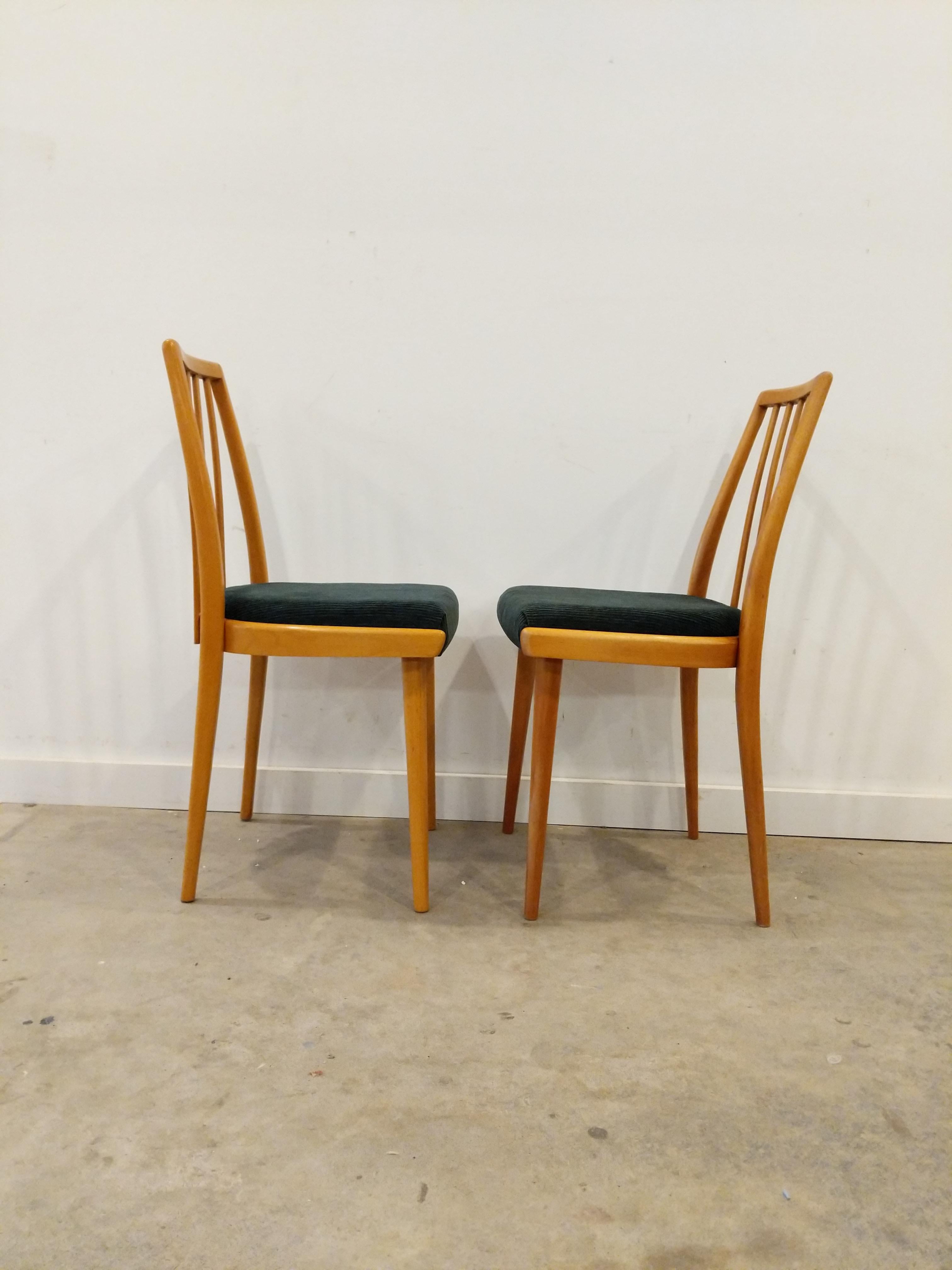 Pair of authentic vintage Czech mid century modern dining chairs.

Made by TON for Interier Praha. Maker's label on bottom.

This set is in excellent condition with brand new Knoll corduroy upholstery!

Knoll Cozy Cord corduroy fabric in Jewel (dark