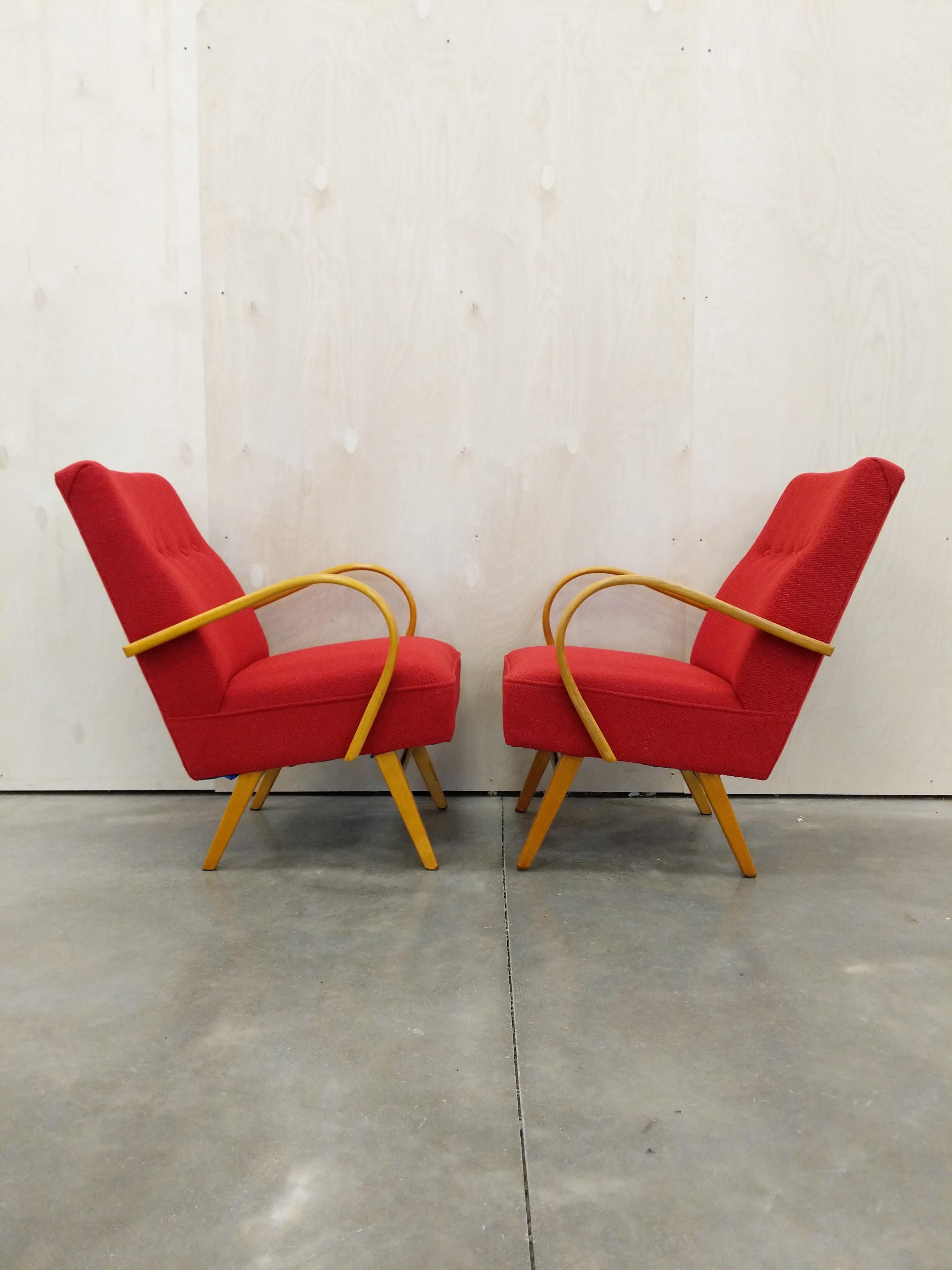 Pair of authentic vintage Czech mid century modern lounge / club chairs.

This set is in excellent refinished condition with brand new Knoll upholstery (see photos).

We used Knoll 