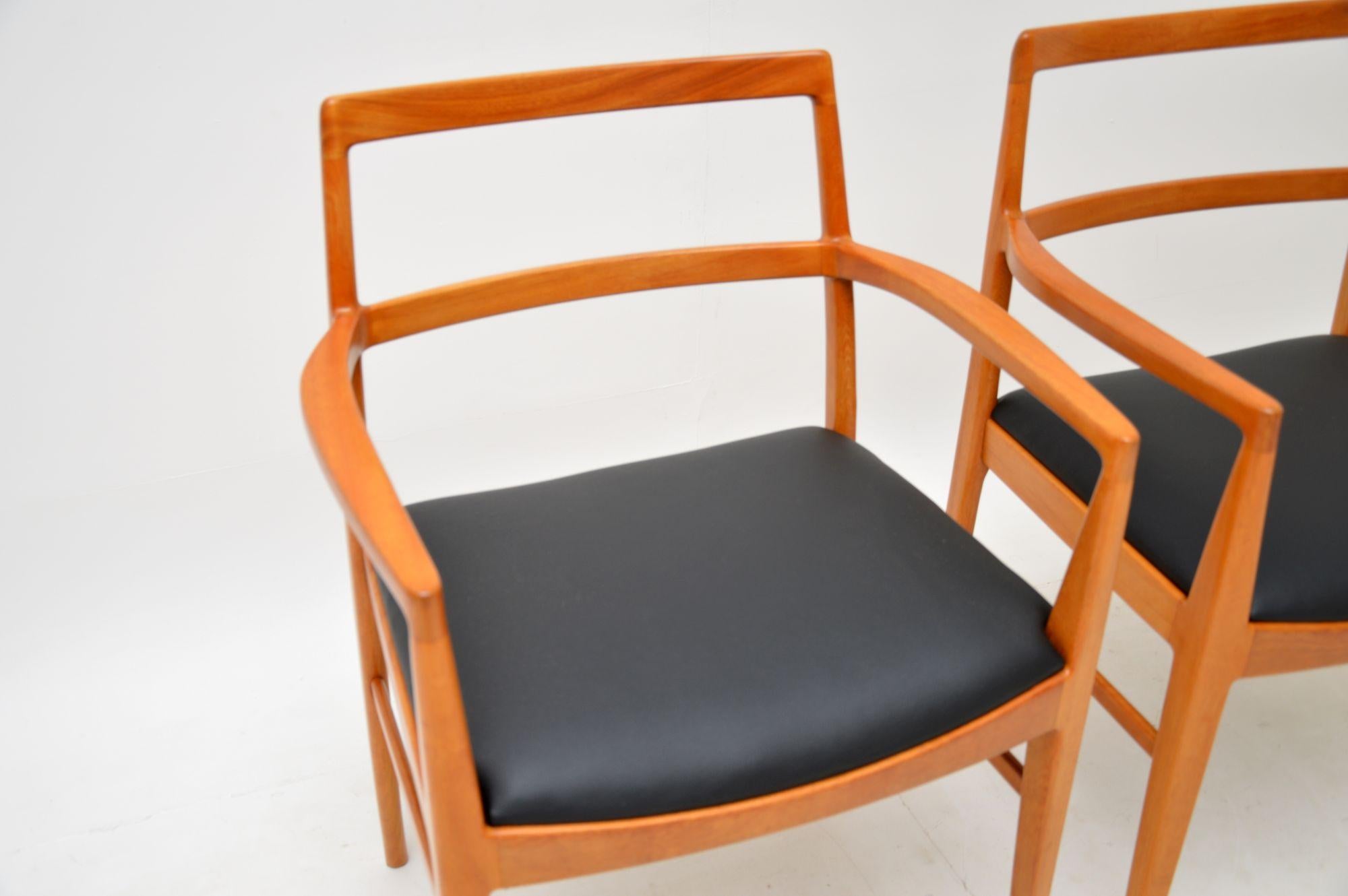 Faux Leather Pair of Vintage Danish Carver Chairs by Arne Vodder for Sibast For Sale