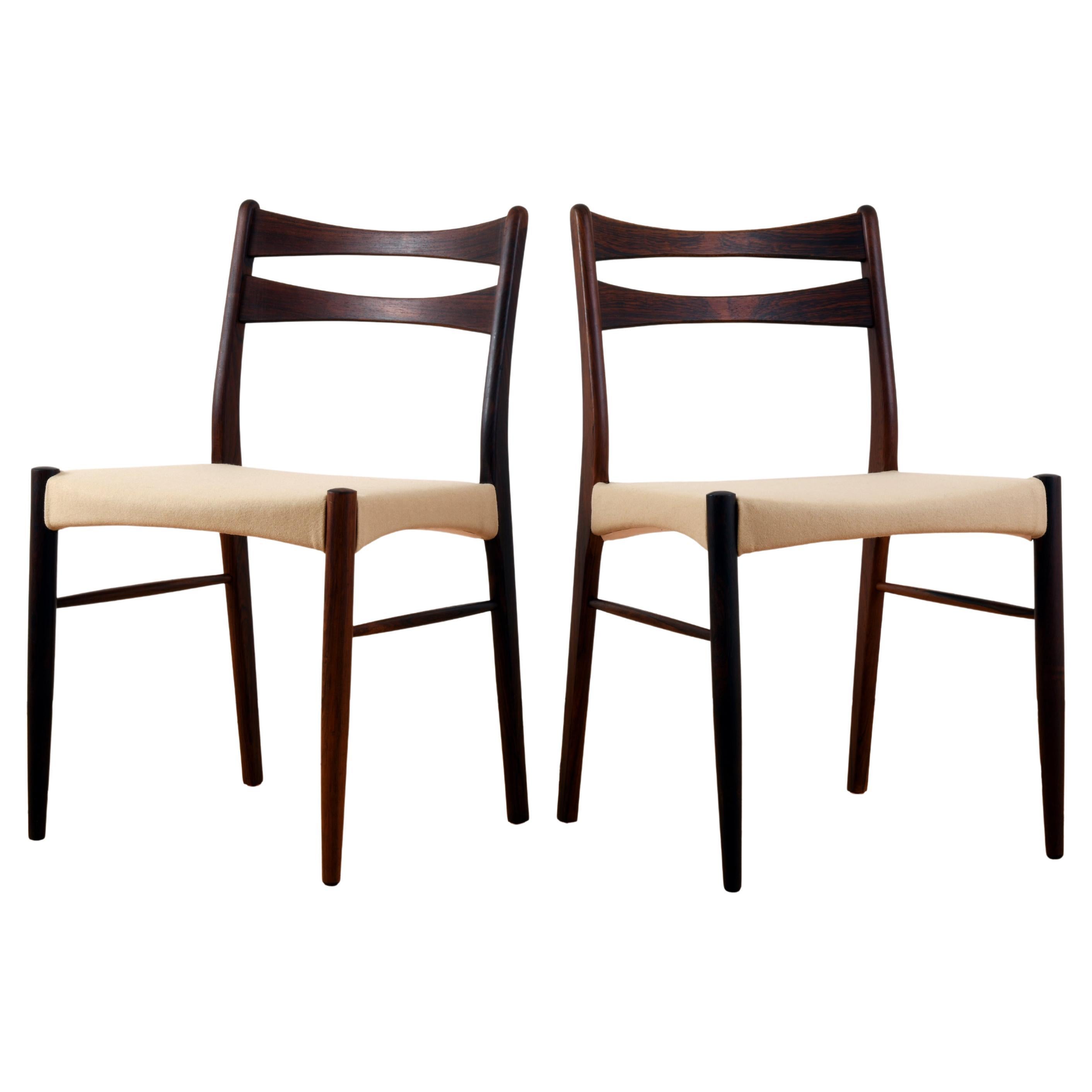 Pair of vintage danish chairs from the sixties, upholstered with wool.