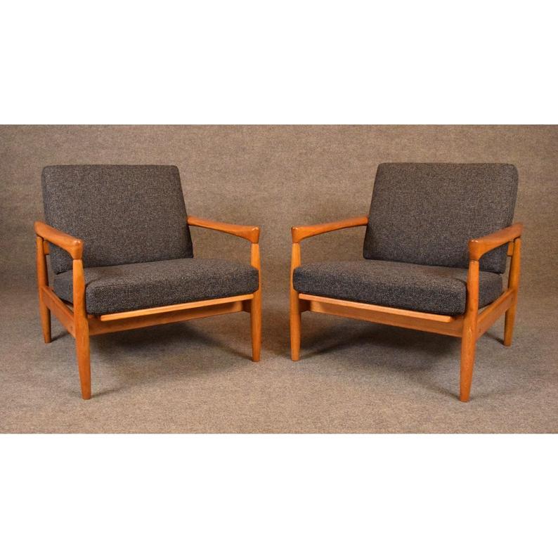 Here is a pair of beautiful Scandinavian modern lounge chair designed by Erik Wortz in the 1960's in Denmark and manufactured by Bröderna Andersson before its recent importation to California.
Each chair features a sculpted solid oak frame with