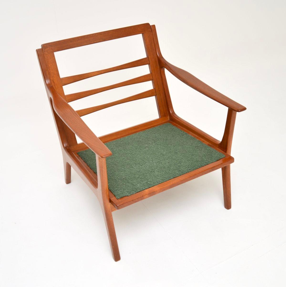 Paire de fauteuils danois vintage en teck en vente 1