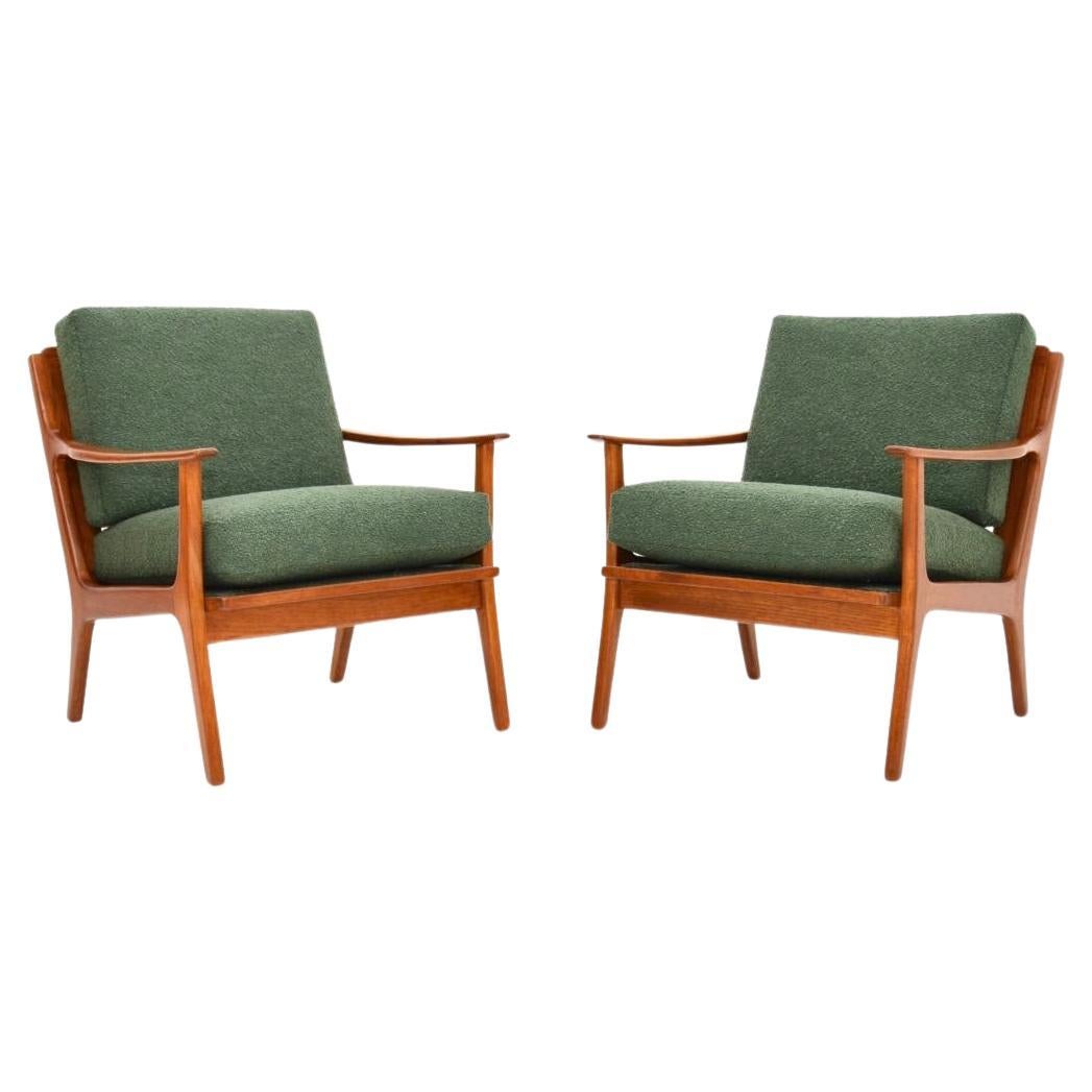 Paire de fauteuils danois vintage en teck en vente