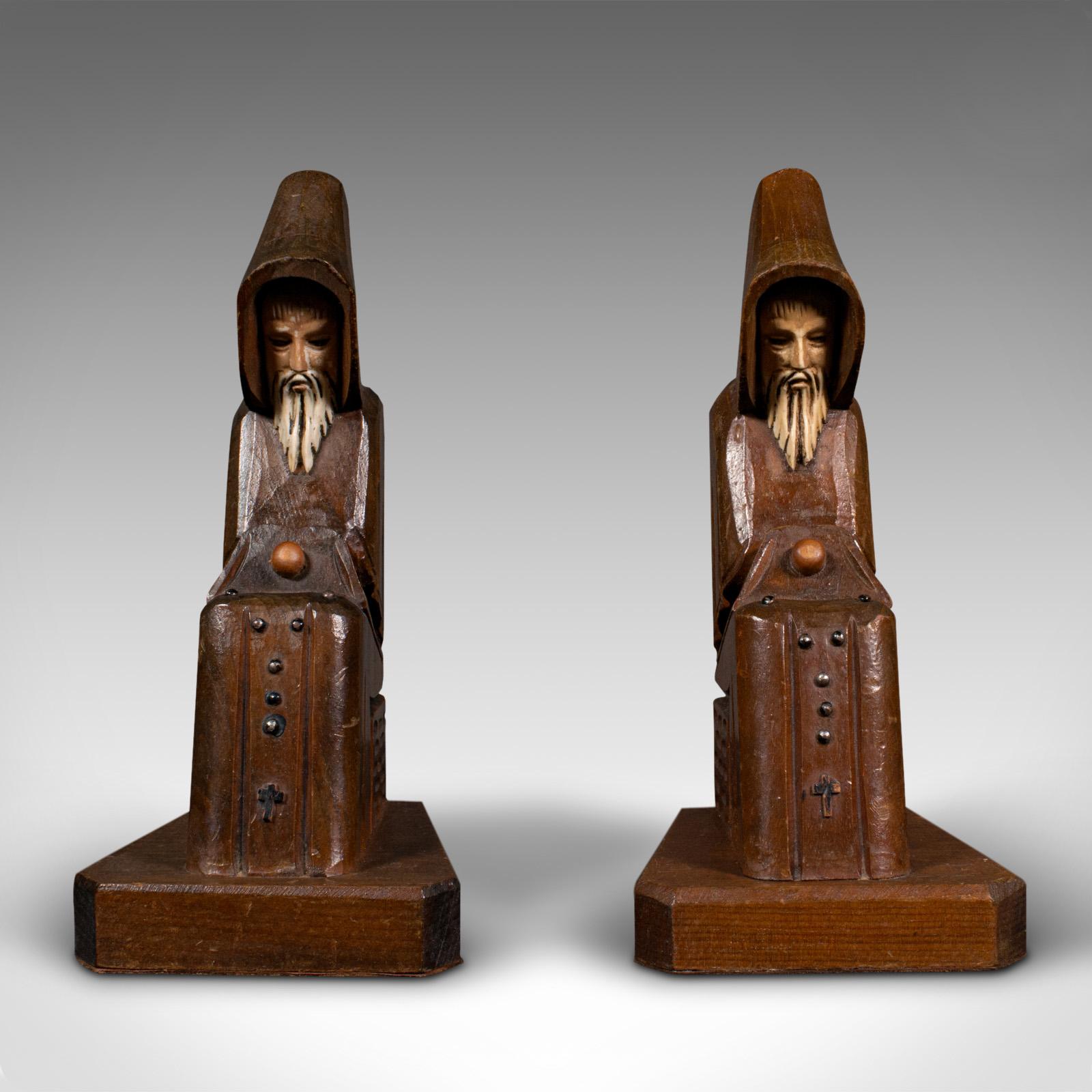 This is a pair of vintage decorative bookends. An Asian, stained pine figural book rest, dating to the late Art Deco period, circa 1940.

Mysterious and intriguing, great for collections of fantasy novels
Displaying a desirable aged patina and in