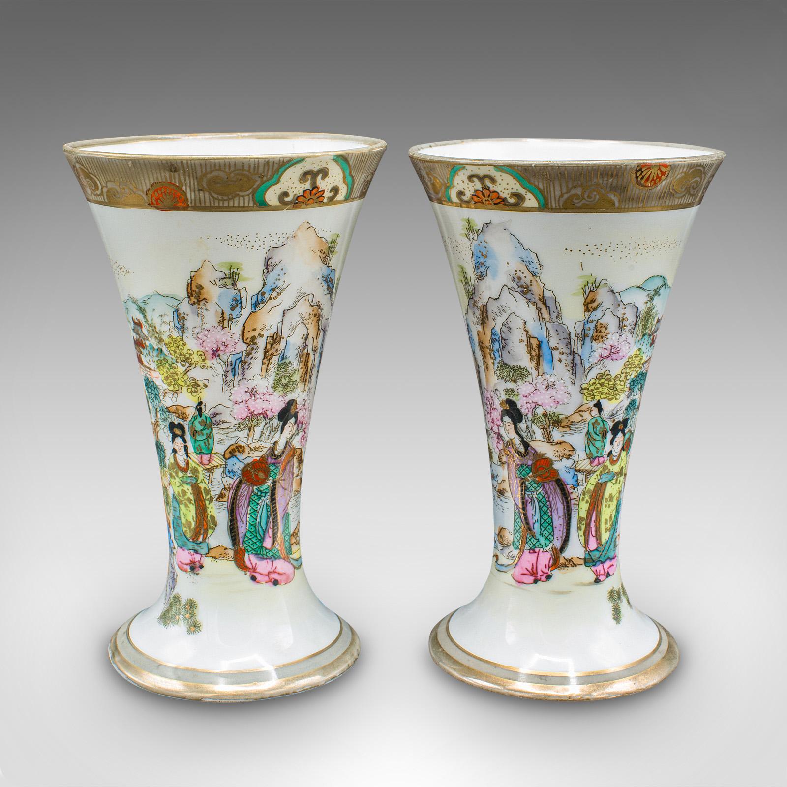 This is a pair of vintage decorative flower vases. A Japanese, ceramic stem flute by Noritake, dating to the Art Deco period, circa 1930.

Charming decor to this petite pair of vases
Displaying a desirable aged patina and in good order
White ceramic