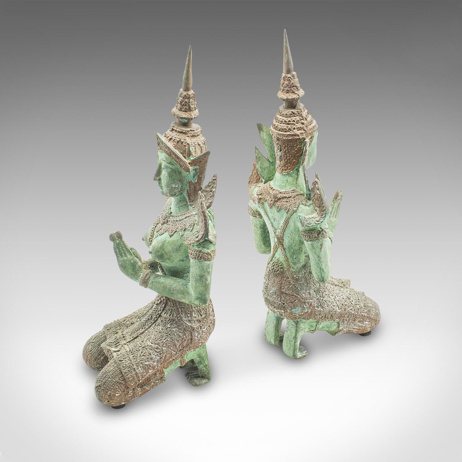 This is a pair of vintage decorative prayer figures. An Oriental, gilt bronze cast iron statue of two kneeling Thai deities, dating to the late Art Deco period, circa 1940.

Appealingly detailed figures, with great colour
Displaying a desirable aged