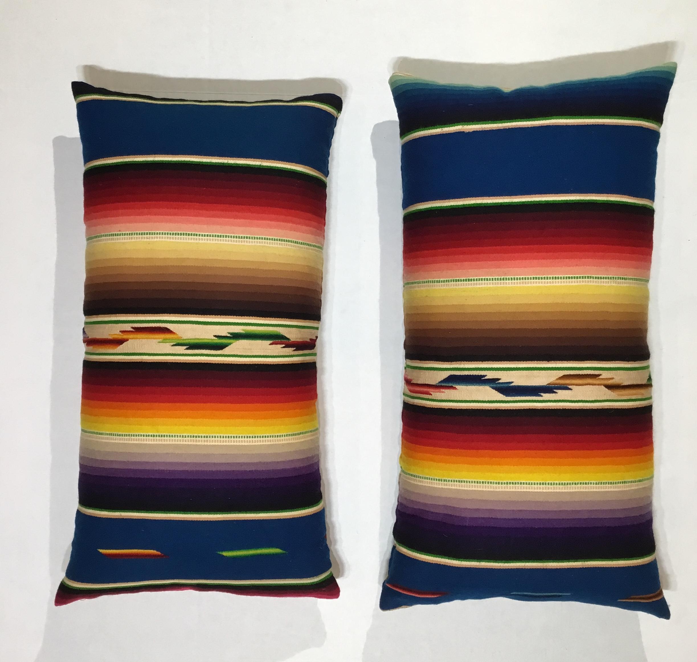 Beautiful pair of pillows made of finely handwoven multi-color vintage Saltillo Mexican blanket.
Originally this price used as wall tapestry and we decided to make pillows from it .the pillows are made with the woven textile back and front ,with
