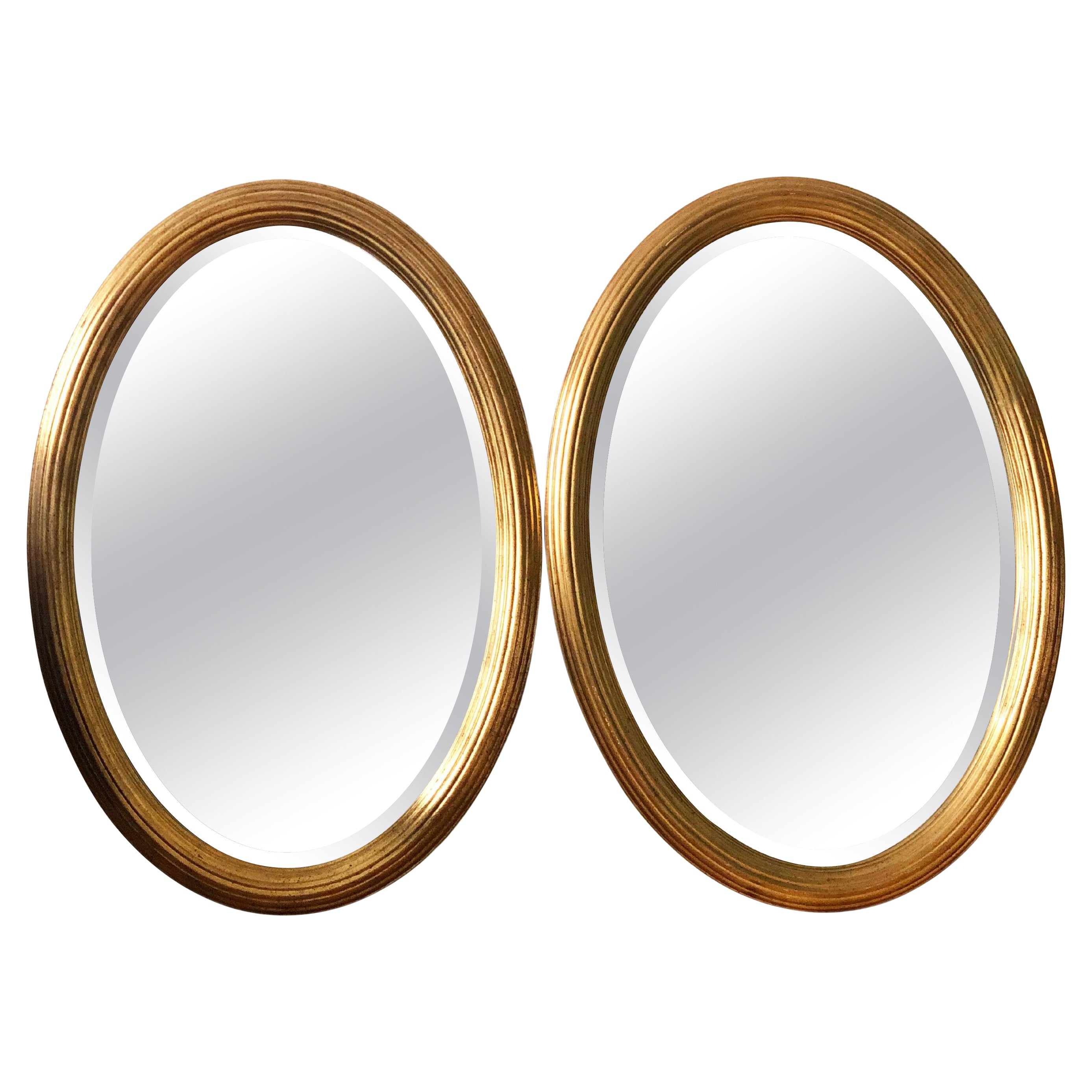 Coppia di specchi ovali d
epoca Deknudt in legno dorato Hollywood Regency Belgio