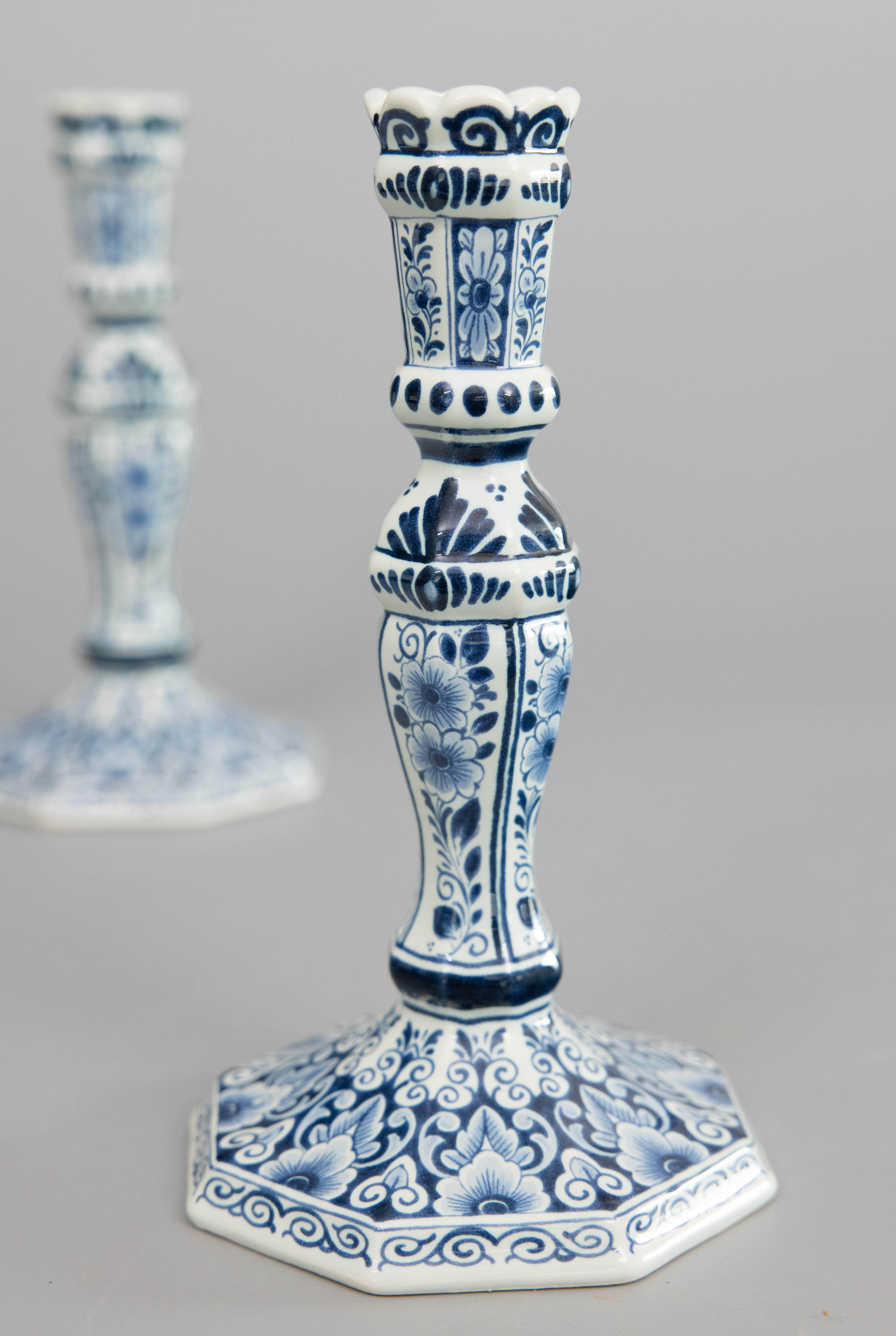 Fired Pair of Mid-20th Century Dutch Delft Faience Floral Candlesticks For Sale