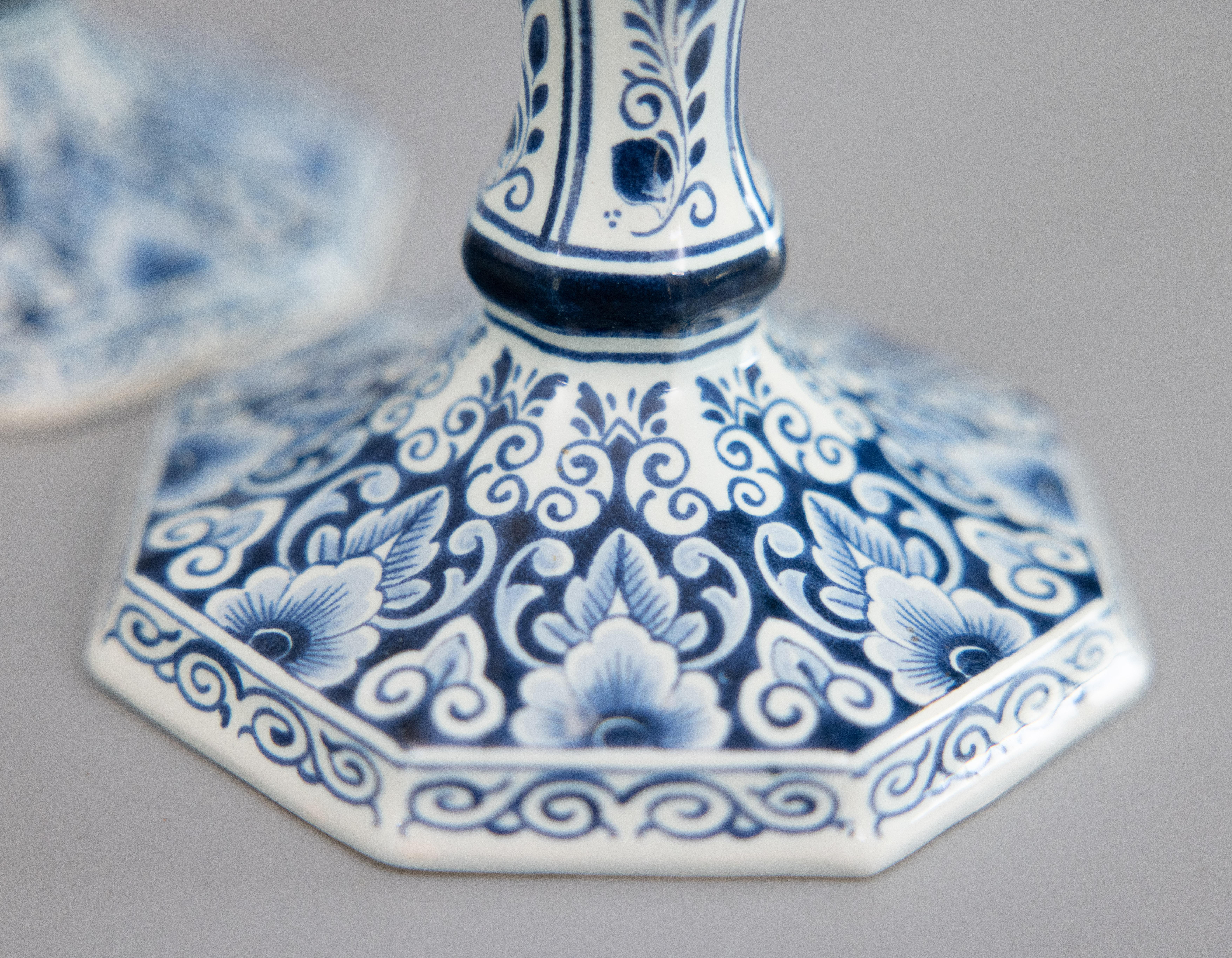 Ceramic Pair of Mid-20th Century Dutch Delft Faience Floral Candlesticks For Sale