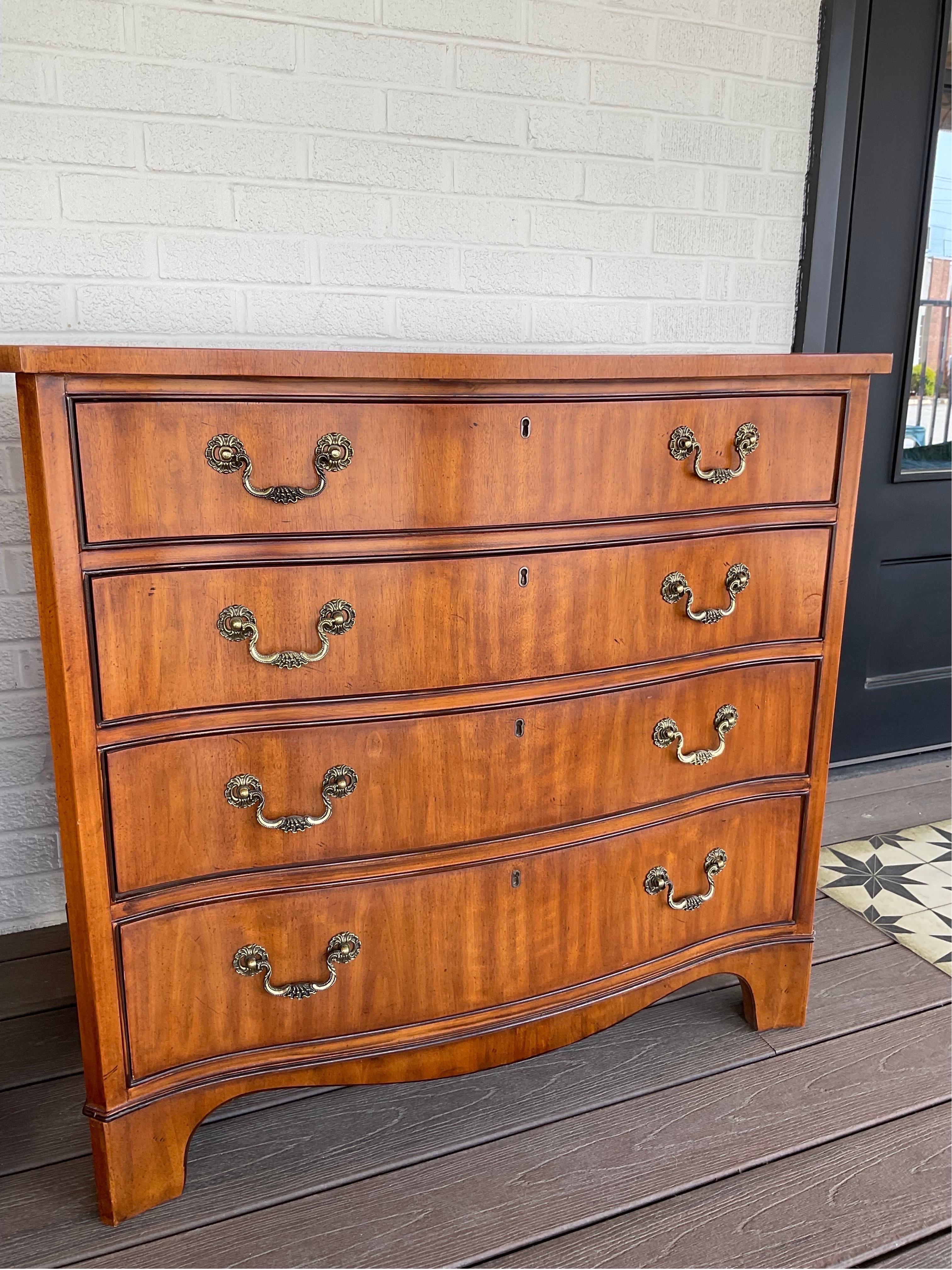 Just a beautiful pair of English Yew Wood Bachelor Chests from Drexel from their Devoncourt Collection. Showing very minor signs of wear, these have been beautifully kept and custom glass tops were made to protect the finishes and are included in