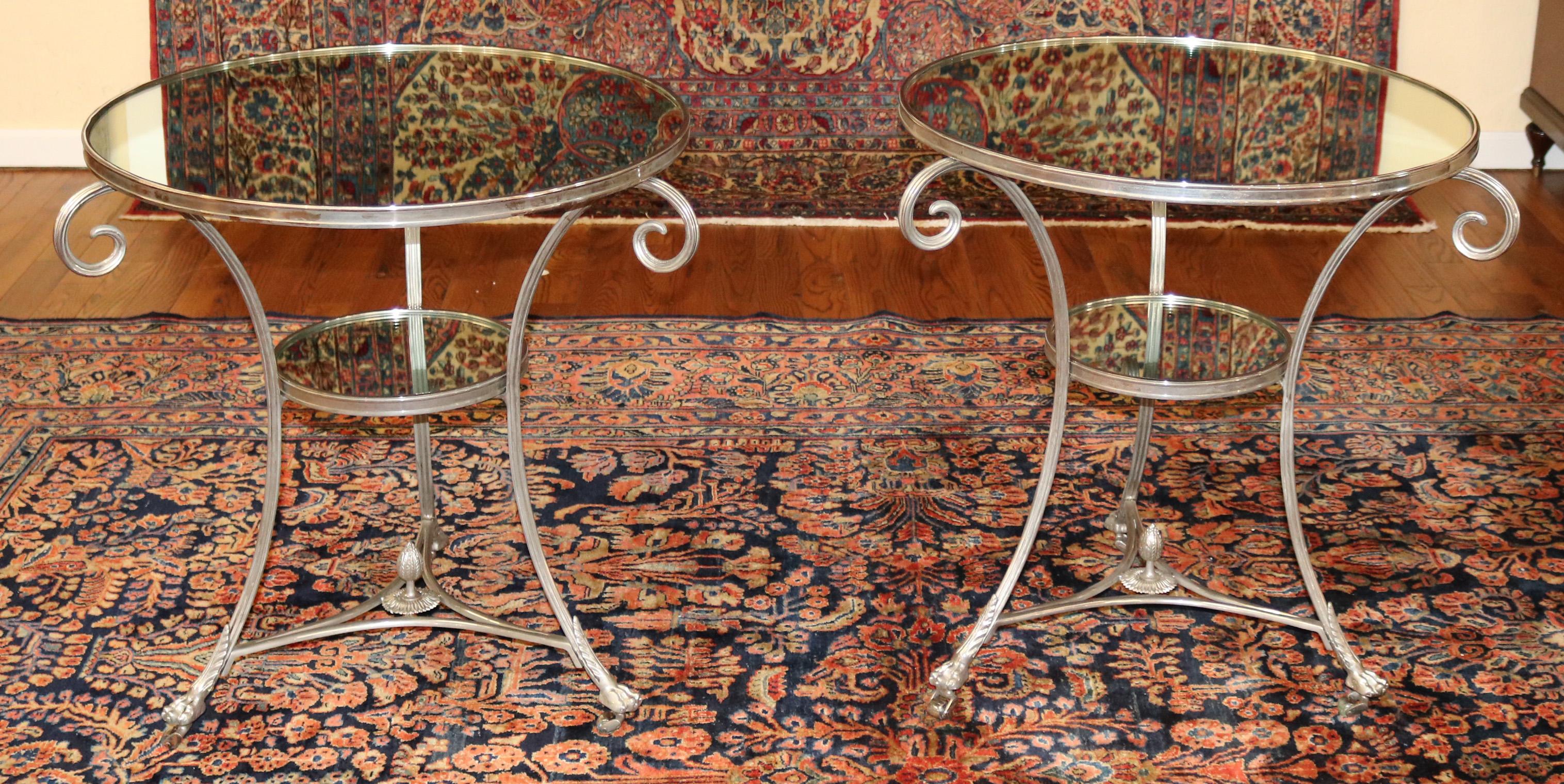Pair of Vintage Directoire French Silver Plated Mirror Top Gueridon End Tables

Dimensions : 27