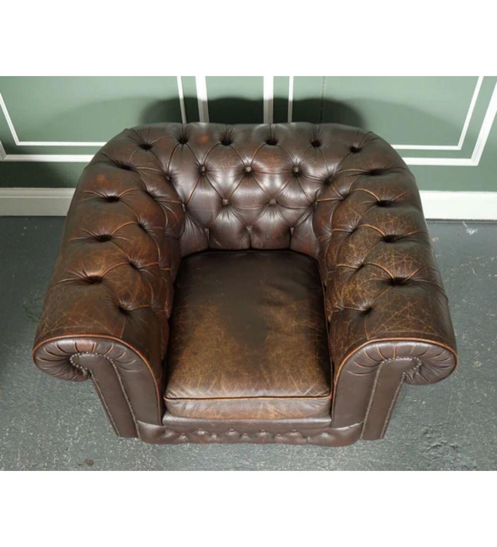 20th Century Pair of Vintage Distressed Brown Leather Chesterfield Club Tub Armchairs For Sale