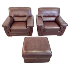 Pareja de sillones holandeses vintage de cuero con otomana