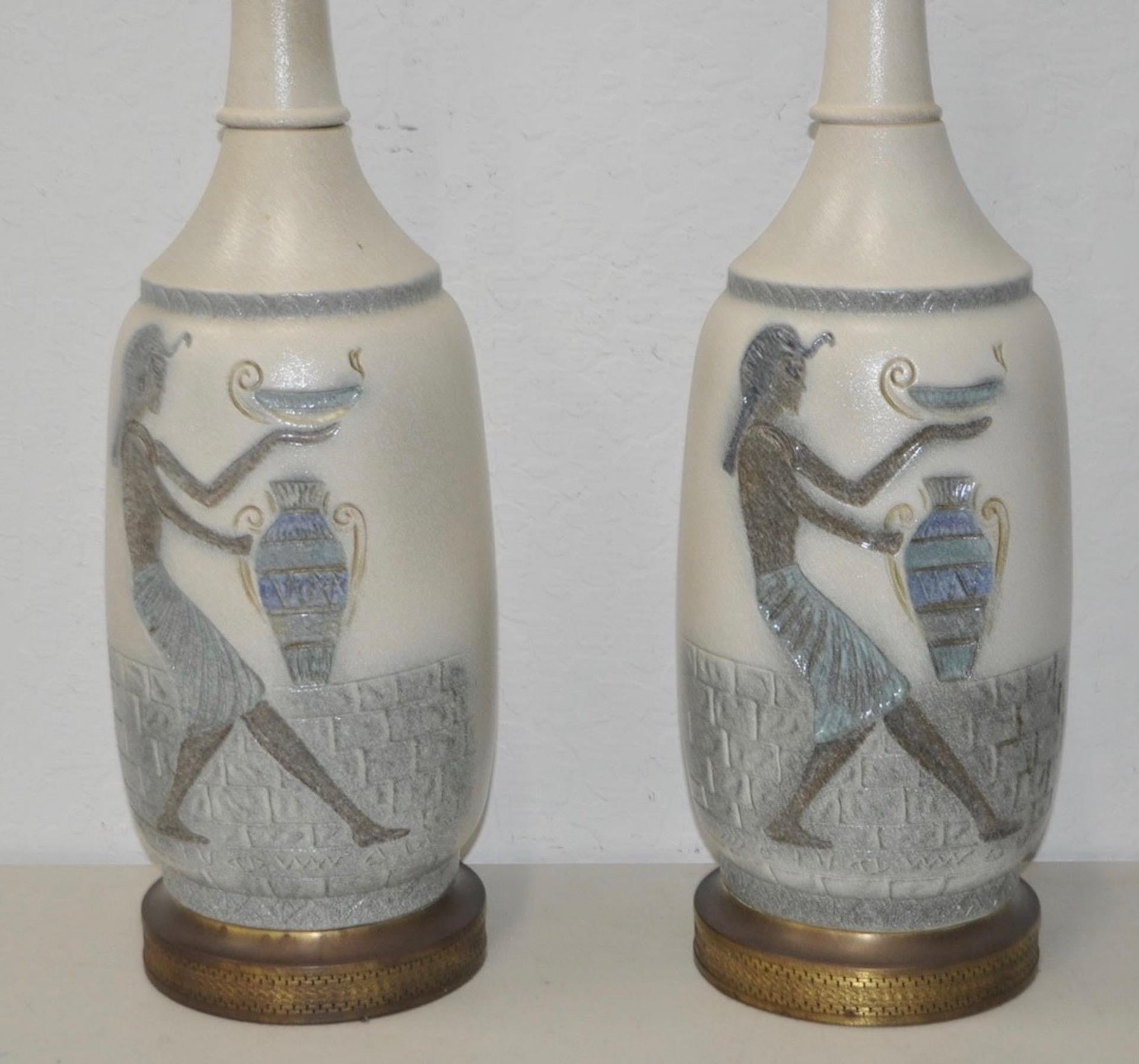 Pair of vintage Egyptian Revival ceramic table lamps, circa 1960s

Walk like an Egyptian with these fantastic vintage table lamps.

This matching pair will look great in any contemporary interior.

Dimensions: 7 1/2
