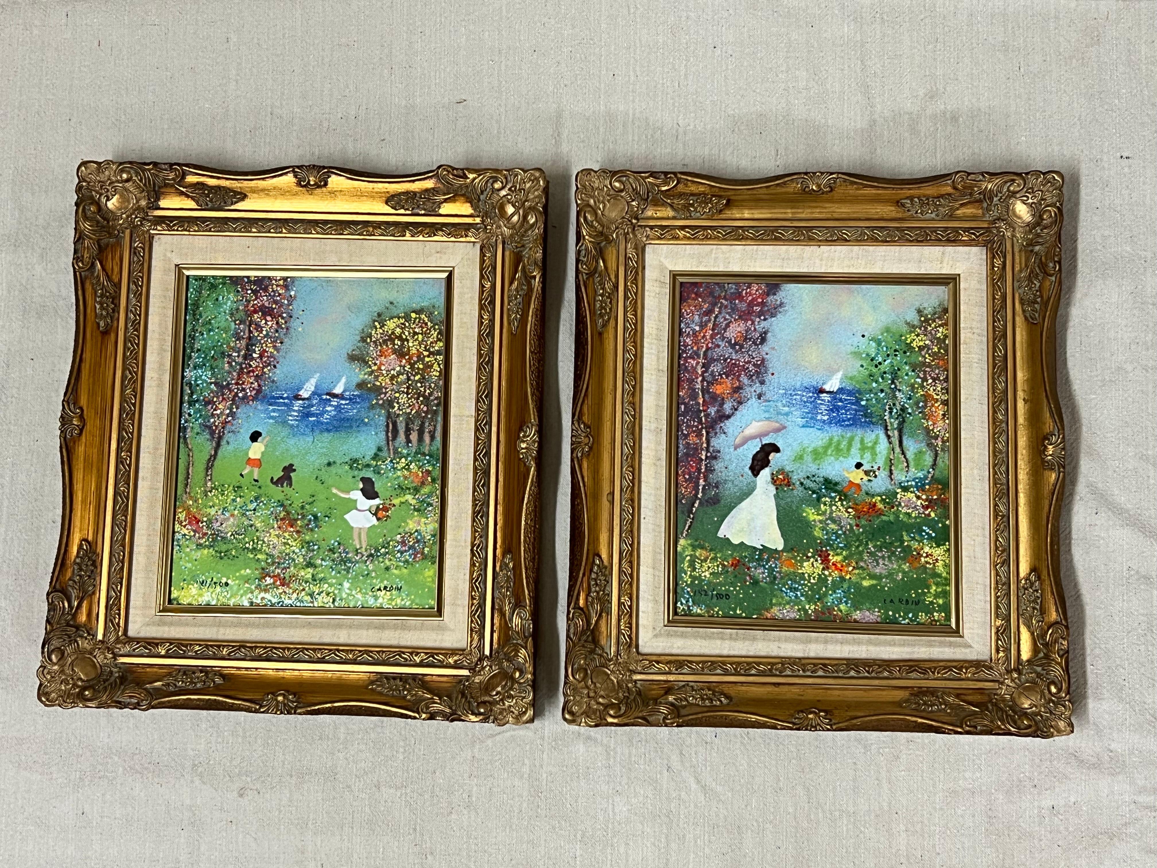 Pair of vintage signed original framed enamel on copper art panels by Louis Cardin. 
Very popular collectible items Circa 1970. Collector's Guild Ltd Certificate of Authenticity on the back of each panel. The first art panel depicts two children ,