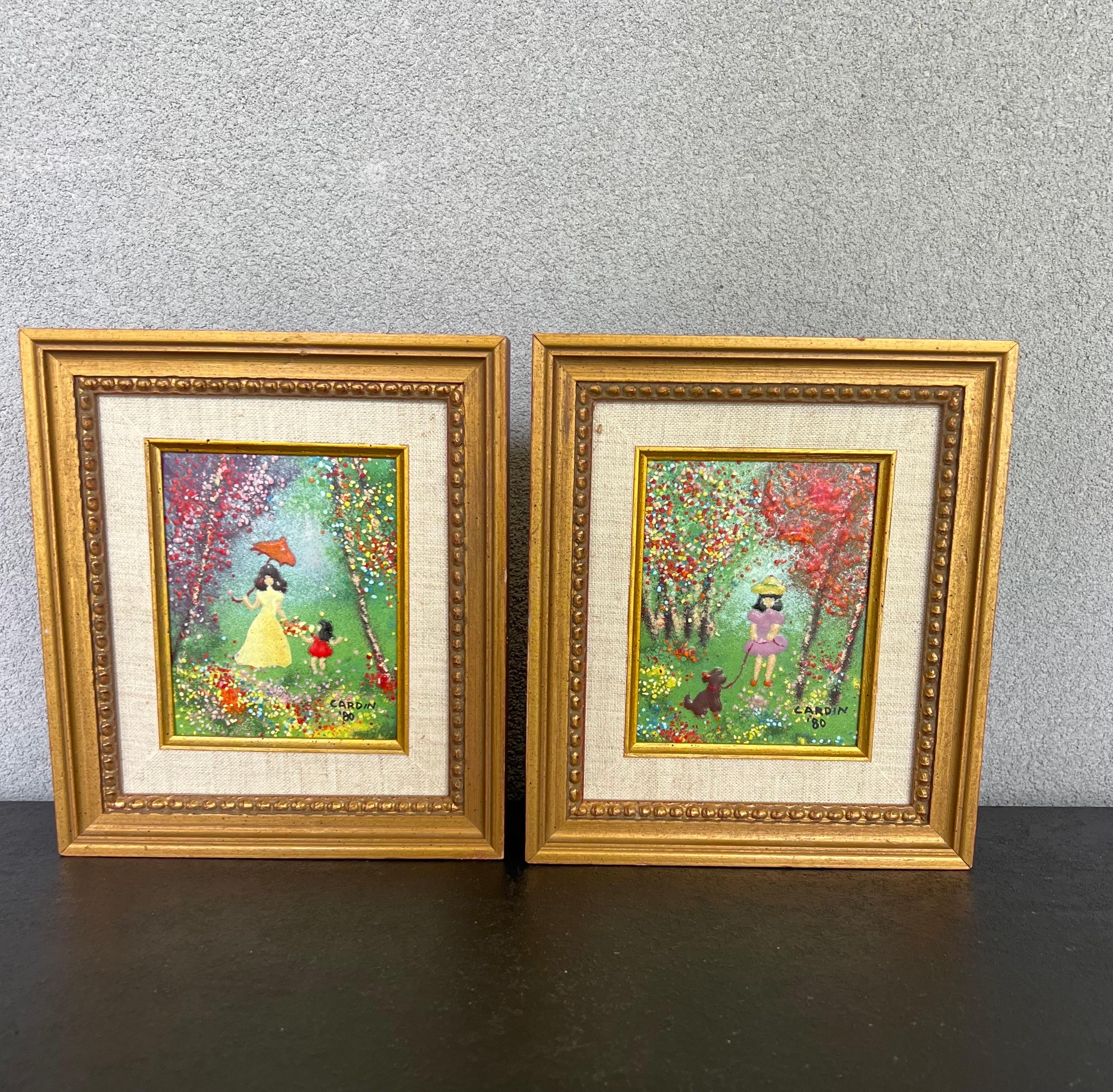 Pair of vintage signed original framed enamel on copper art panels by Louis Cardin.
Very popular collectible items Circa 1980 
Rich vibrant colors with a gold frame. painted by French Artist Louis Cardin 