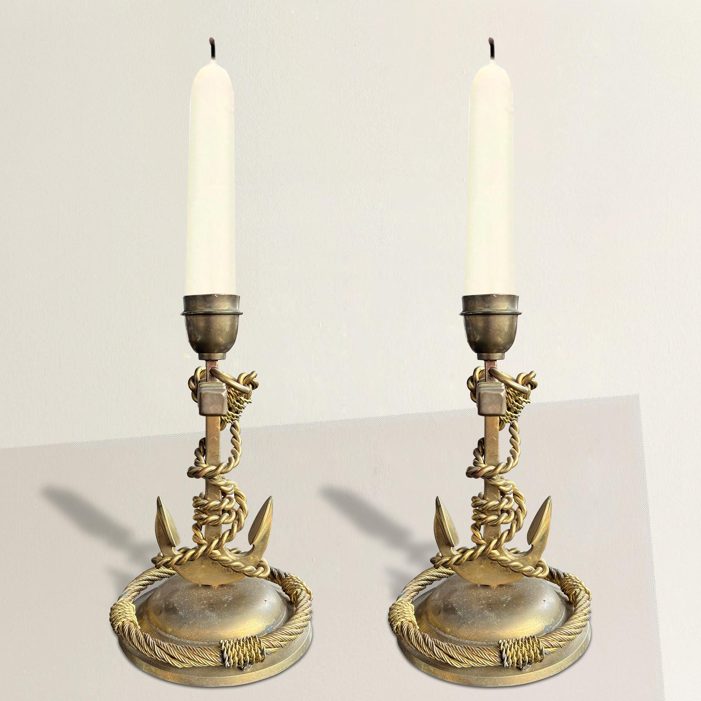 These exquisite vintage English brass candlesticks showcase a captivating anchor design that is sure to enchant any admirer of fine craftsmanship. Fashioned in the form of anchors, these candlesticks exude a nautical charm with a touch of romance.