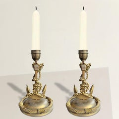 Coppia di candelabri ad ancora inglesi d'epoca in ottone